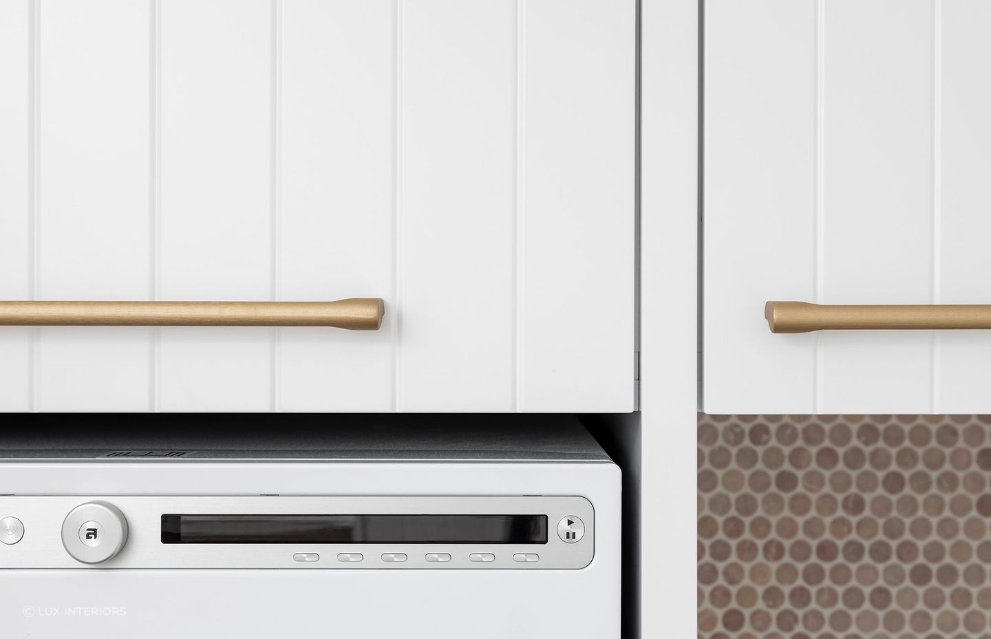 Most modern washing machines have advanced but intuitive controls for ease of use, seen here in the Sholl Project by Lux Interiors.