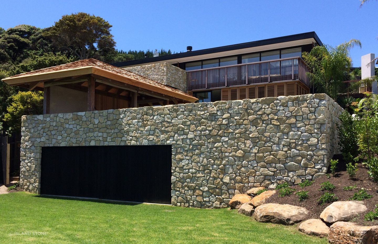 A stunning retreat in Lang's Beach featuring limestone cladding from Island Stone.