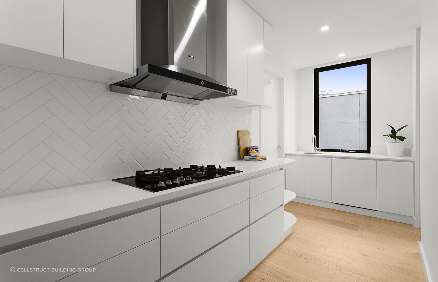 Spot the dishwasher?... The subtle style of a fully integrated ASKO dishwasher in this Mont Albert Project by Cellstruct Building Group. | Photography: Grant Kennedy