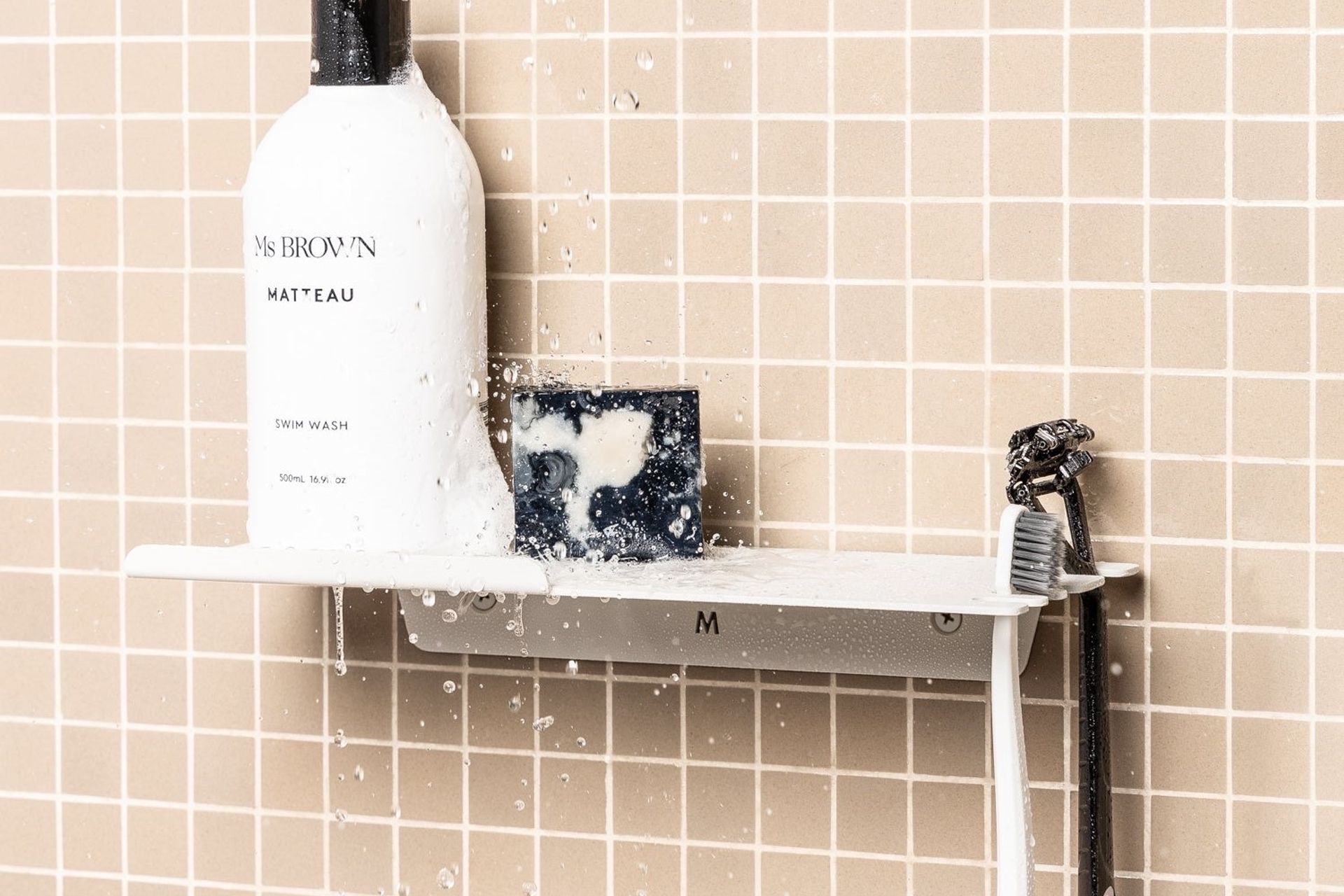 A shower shelf option like the Fold Shower Shelf is easy to install and can accommodate a range of different toiletries.