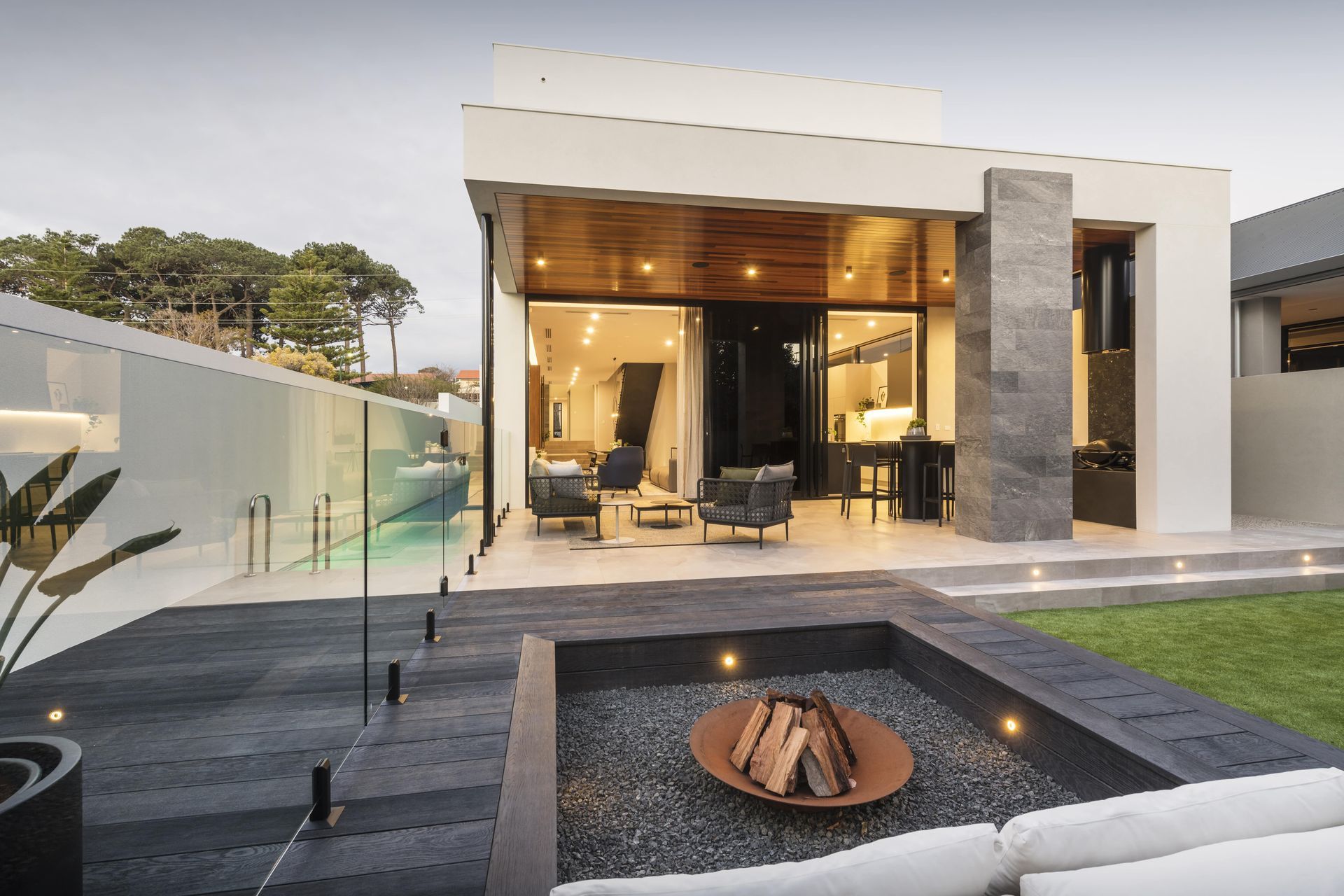 Millboard Burnt Cedar decking and firepit.