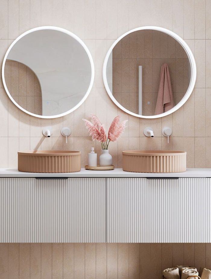 The Minka Curved Wall Hung Vanities save invaluable floor space in the bathroom.