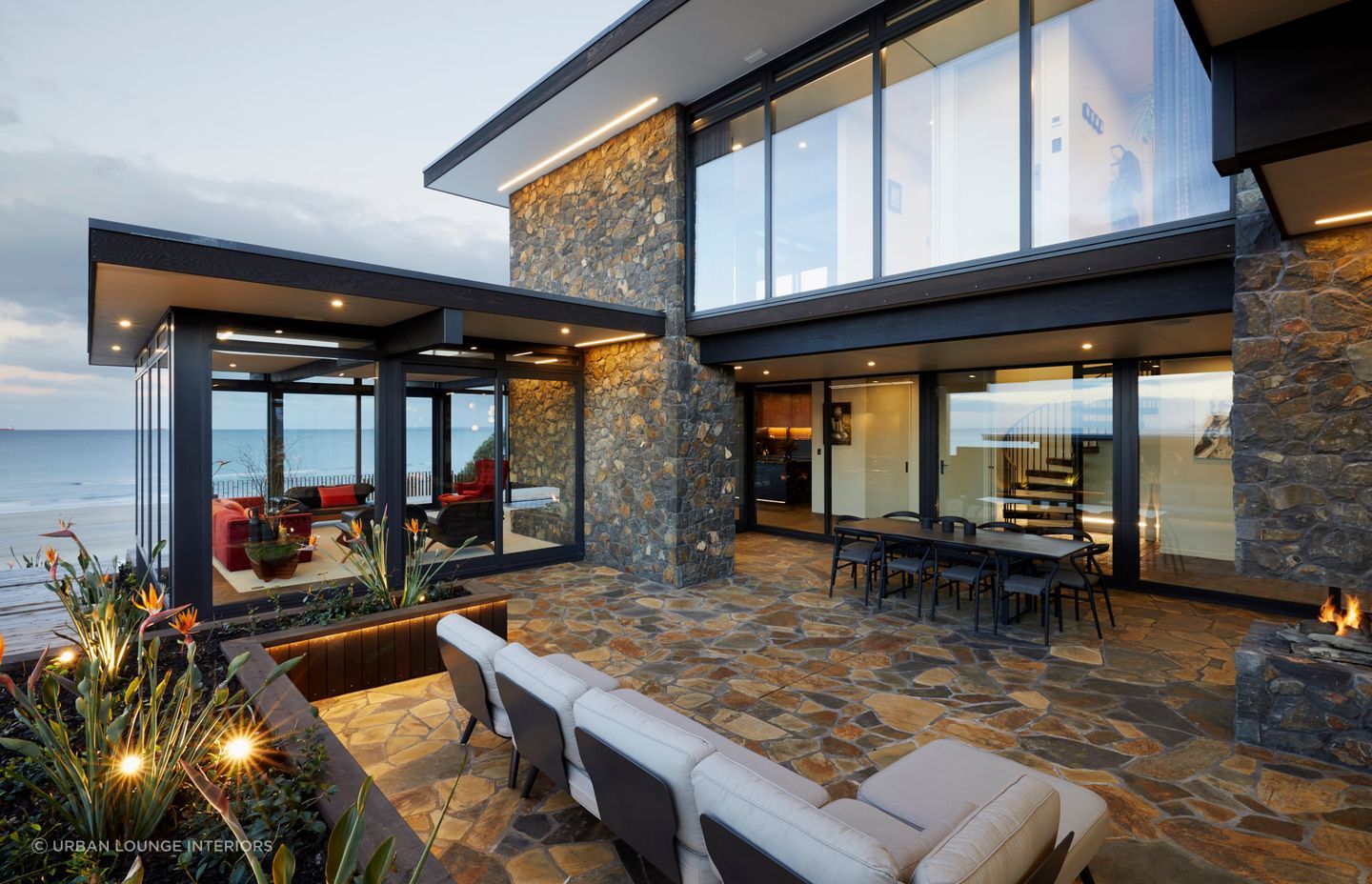 A complementary choice of cladding and tiles with this incredible beachfront home in Mount Maunganui.