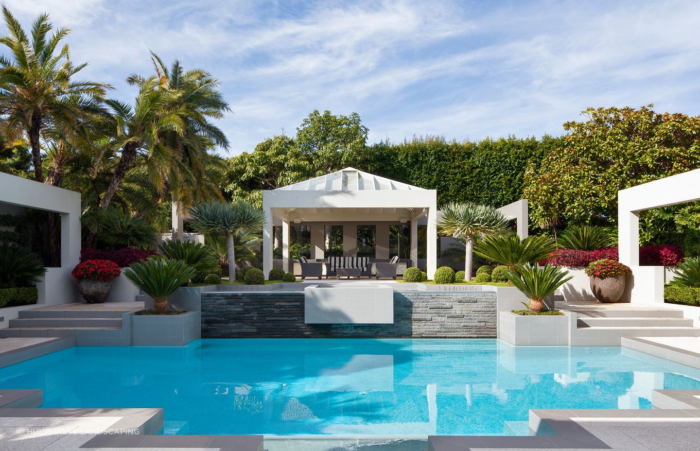 This exquisite outdoor space in Orakei shows how hardscaping and softscaping can work together to create contrast and cohesion.
