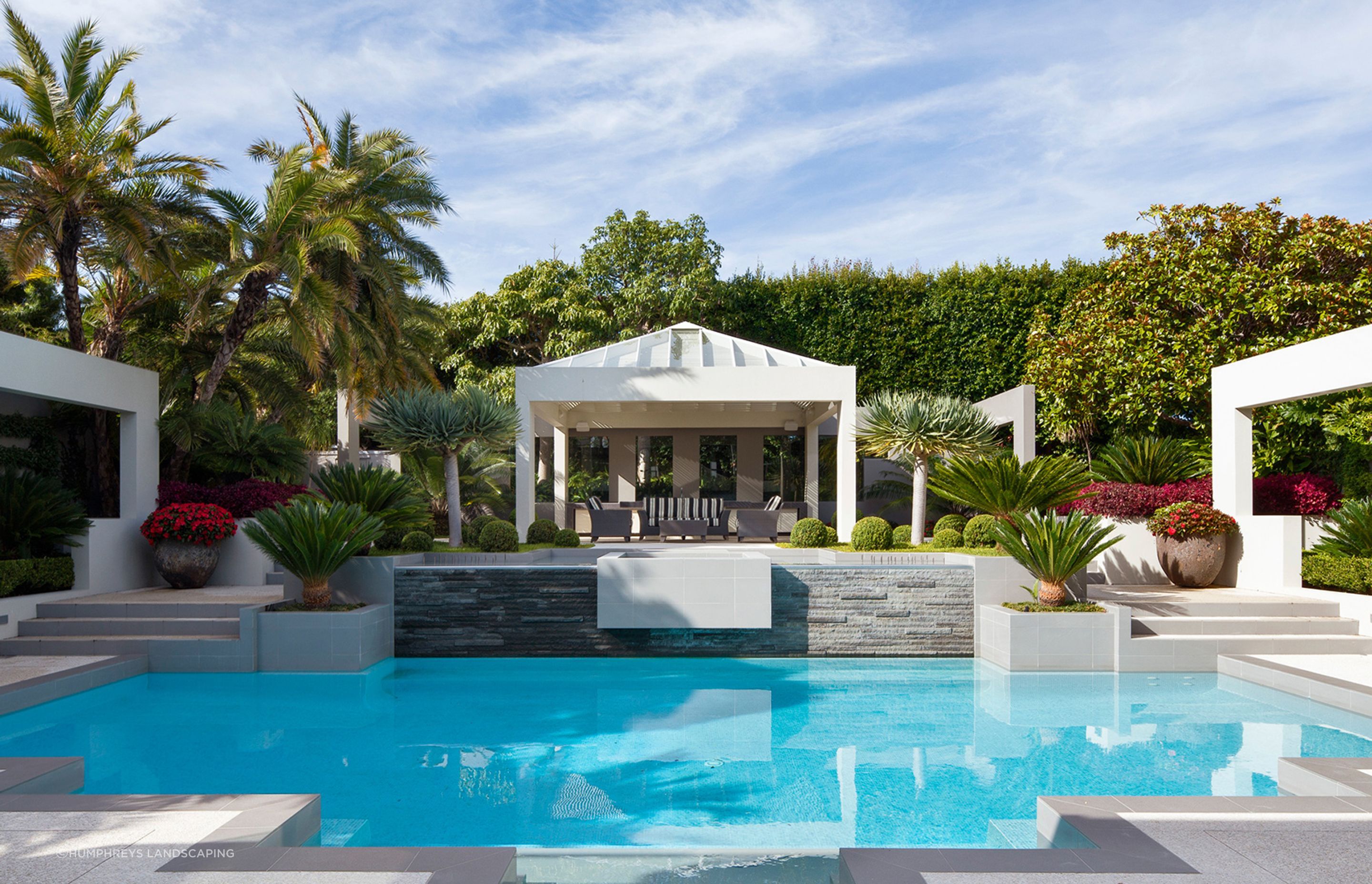 This exquisite outdoor space in Orakei shows how hardscaping and softscaping can work together to create contrast and cohesion.