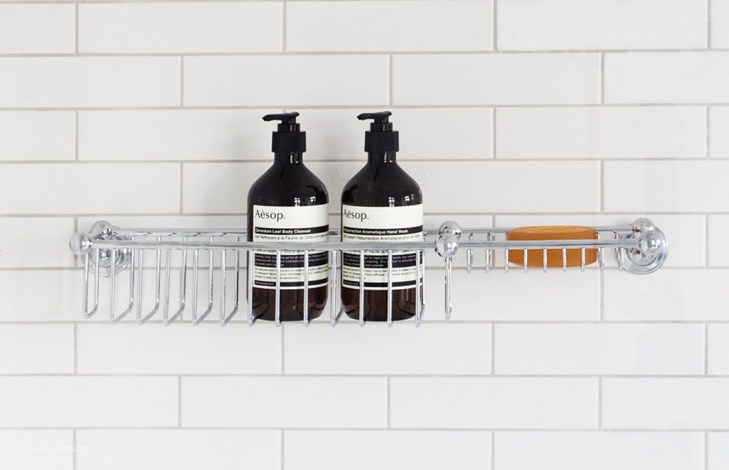 The elegant Perrin & Rowe Shower Basket with Soap Tray allows full drainage for easy cleaning and maintenance.