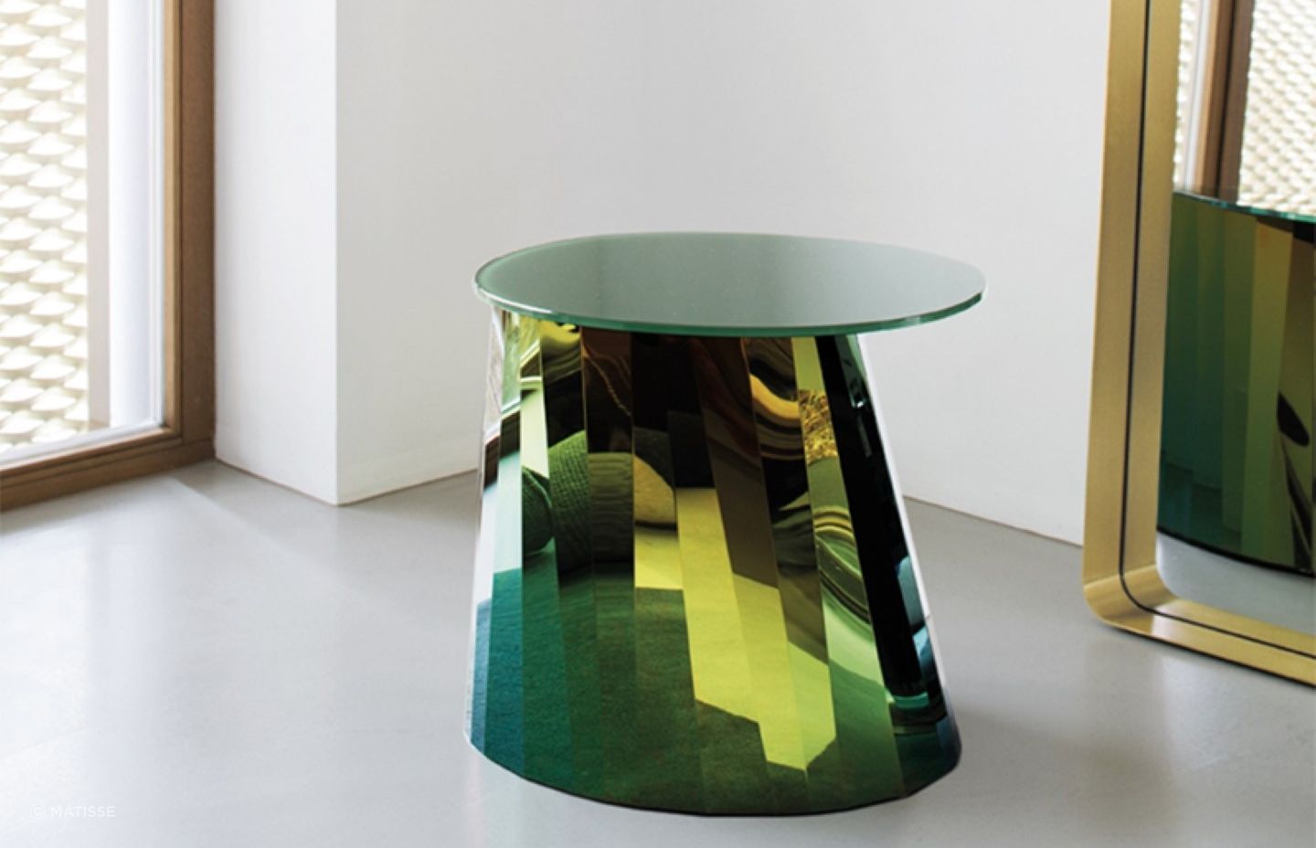 They don't get more glamourous and glossy than the Pli Side Table by Classicon