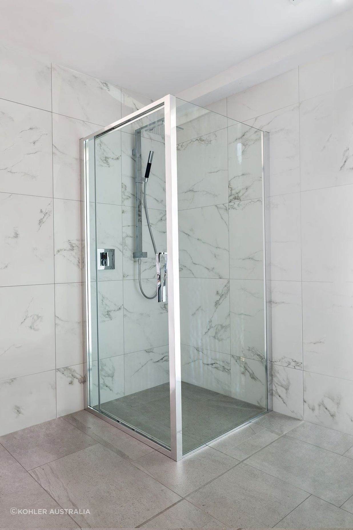Pivot door shower screens can open inward or outward, depending on the positioning of the mechanism and hinge. Featured product: Torsion Square Corner Inswing Shower.