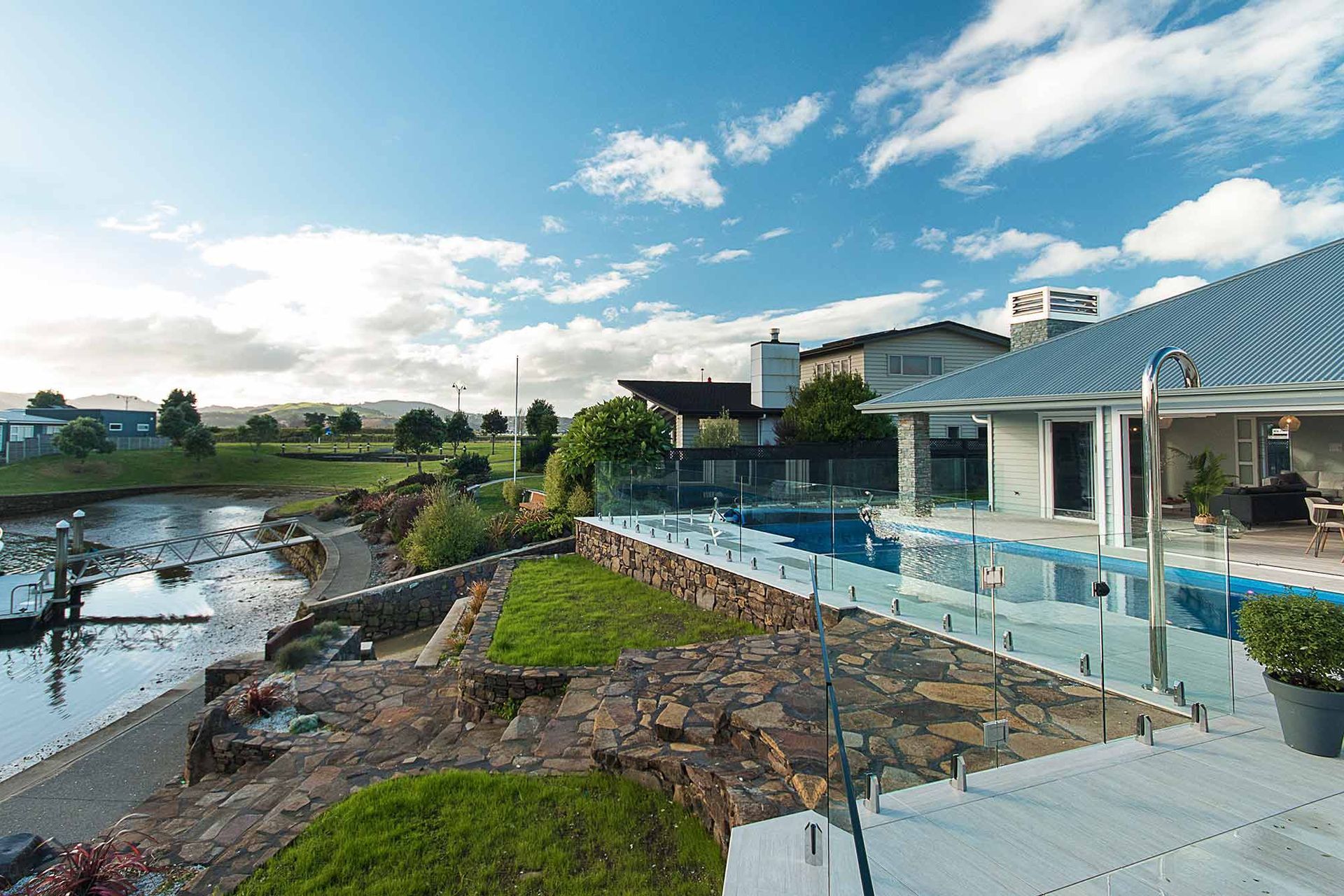 Glass fencing offers unobstructive views, fantastic when you've got surroundings like this to enjoy.