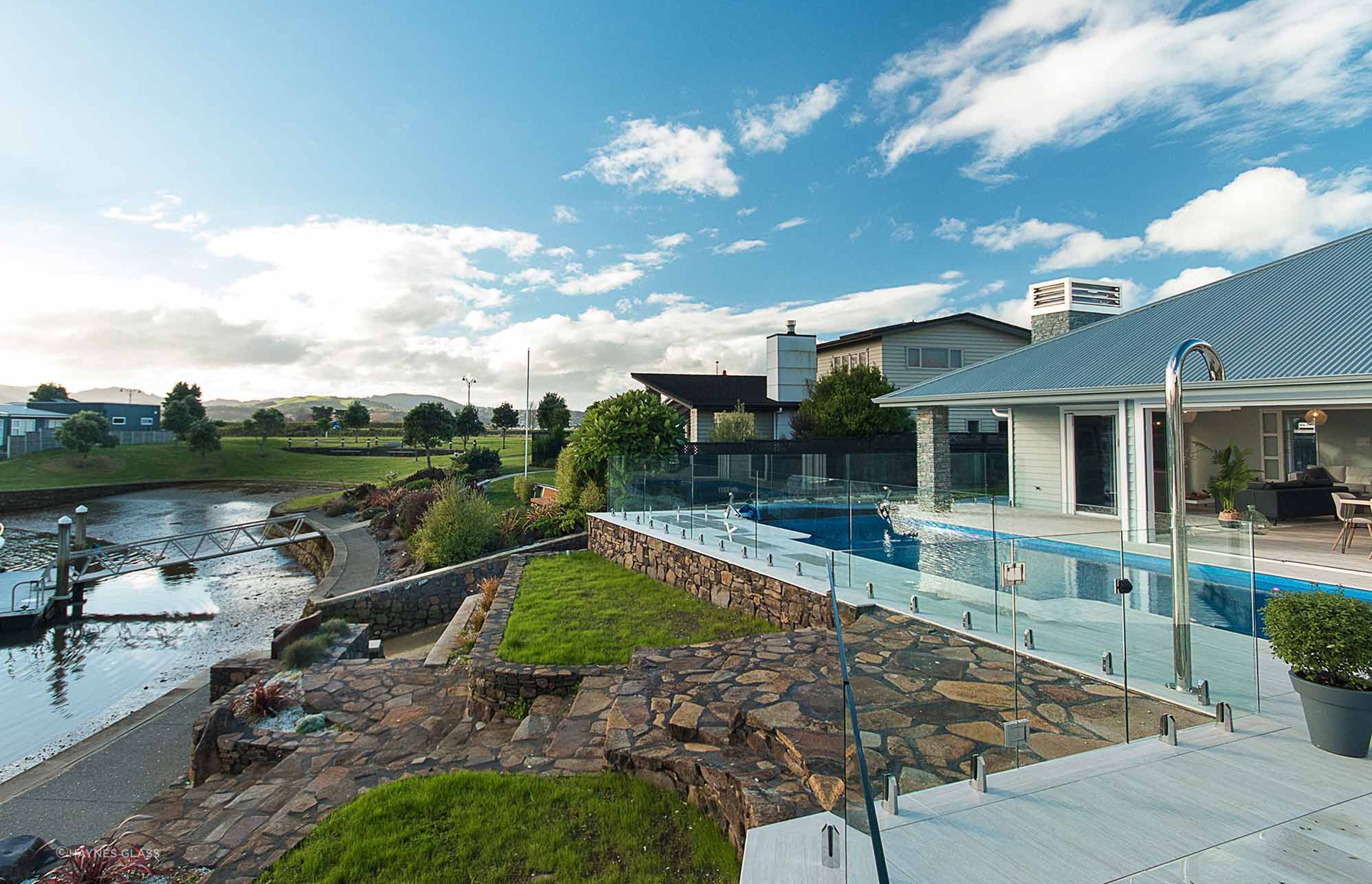 Glass fencing offers unobstructive views, fantastic when you've got surroundings like this to enjoy.