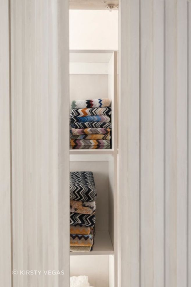 This clever use of space helped to create a hidden linen cupboard.