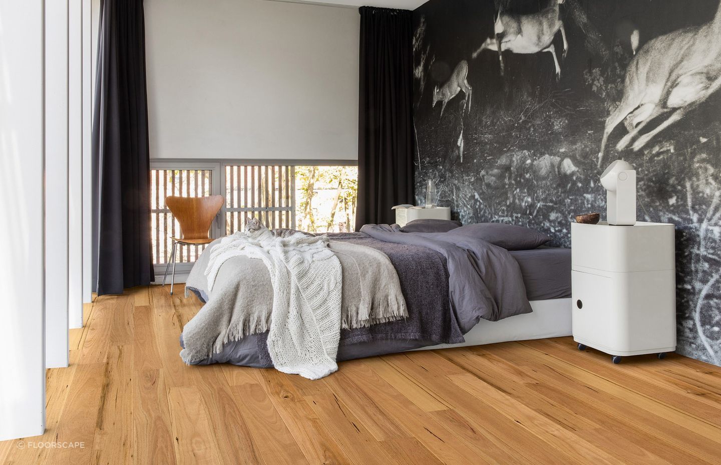 Wooden flooring with natural lightness, like this Quick-step Amato Blackbutt Flooring, will brighten a space effortlessly.