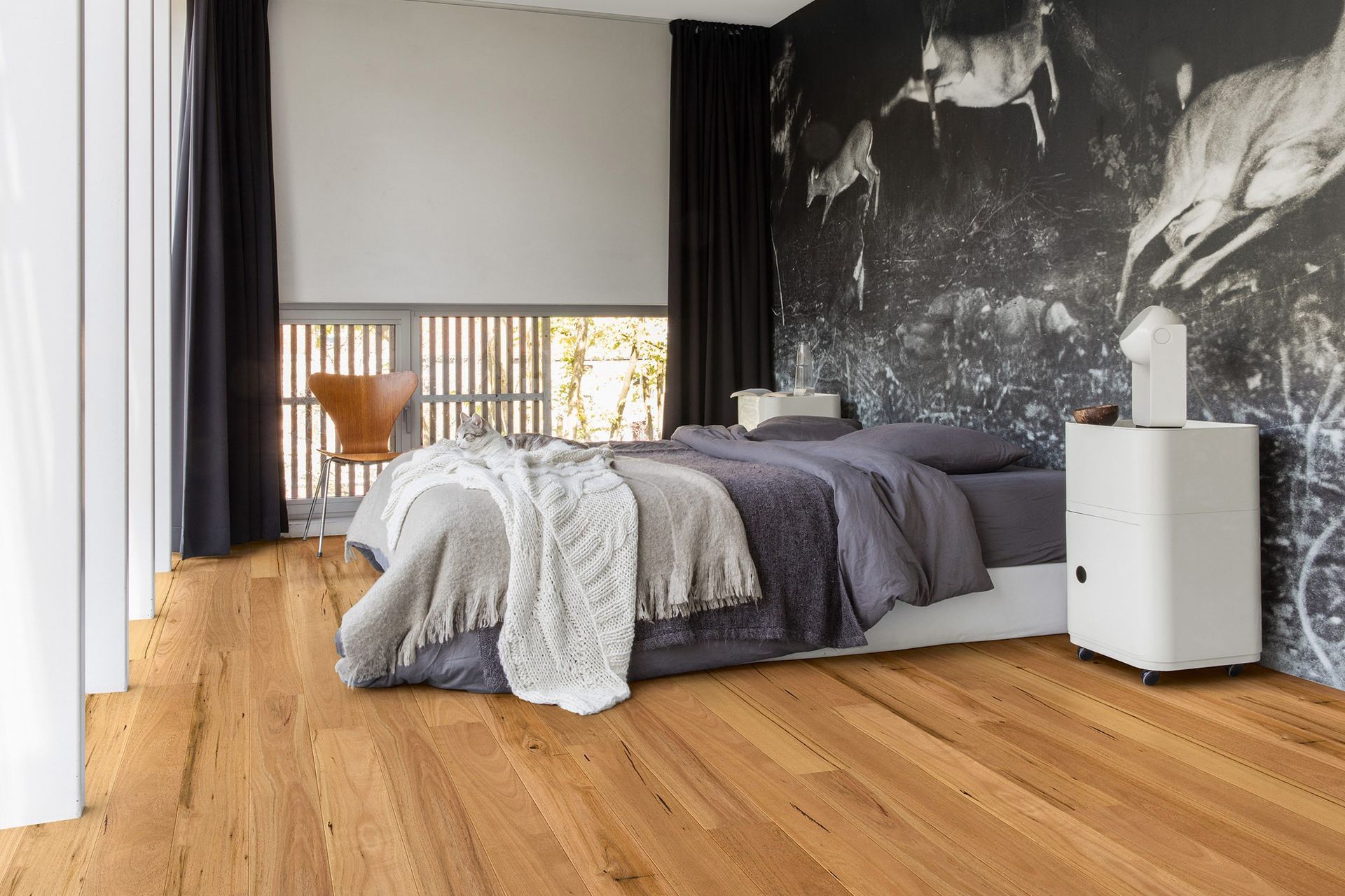 Wooden flooring with natural lightness, like this Quick-step Amato Blackbutt Flooring, will brighten a space effortlessly.