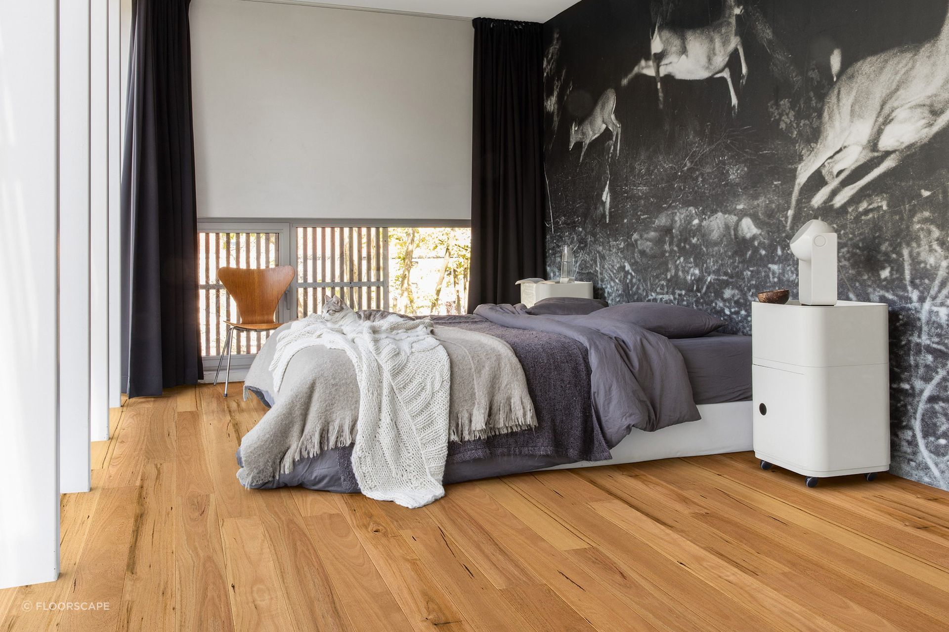 Wooden flooring with natural lightness, like this Quick-step Amato Blackbutt Flooring, will brighten a space effortlessly.