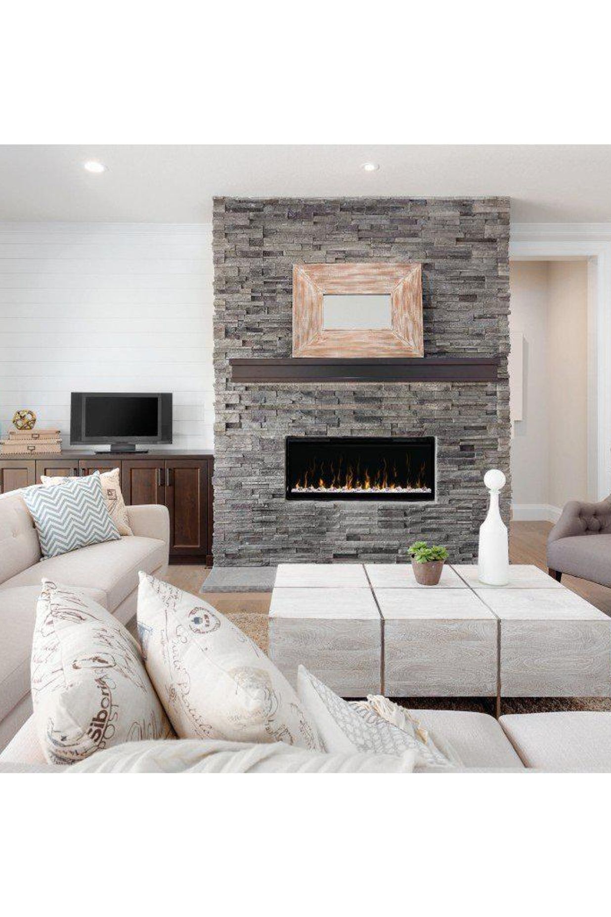 The Prism Electric Fireplace suits the neutral, sandy tones of this living space.