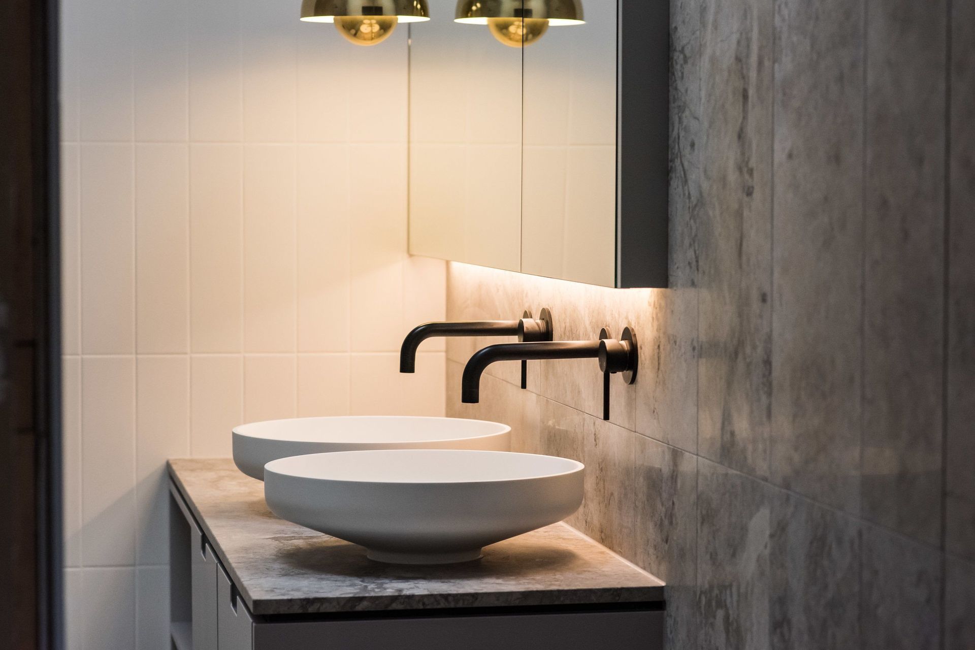 Distinctive appeal and less visible water marks — great reasons to go for an option like these Round Wall Mixer Taps in Matte Black.