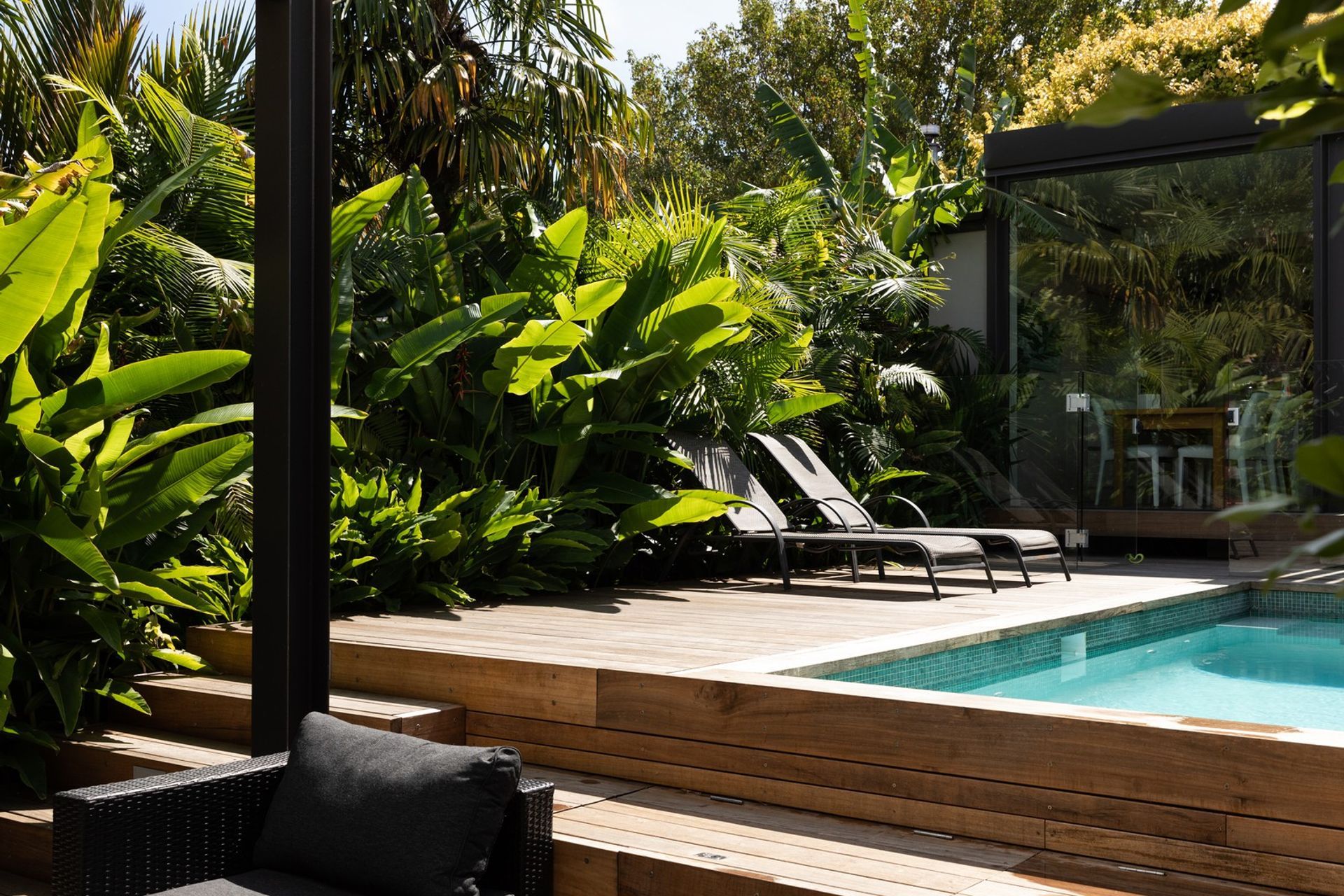 Picking plants that will prosper in your climate is fundamental to success, seen here in this stylish outdoor space in sub-tropical Auckland.