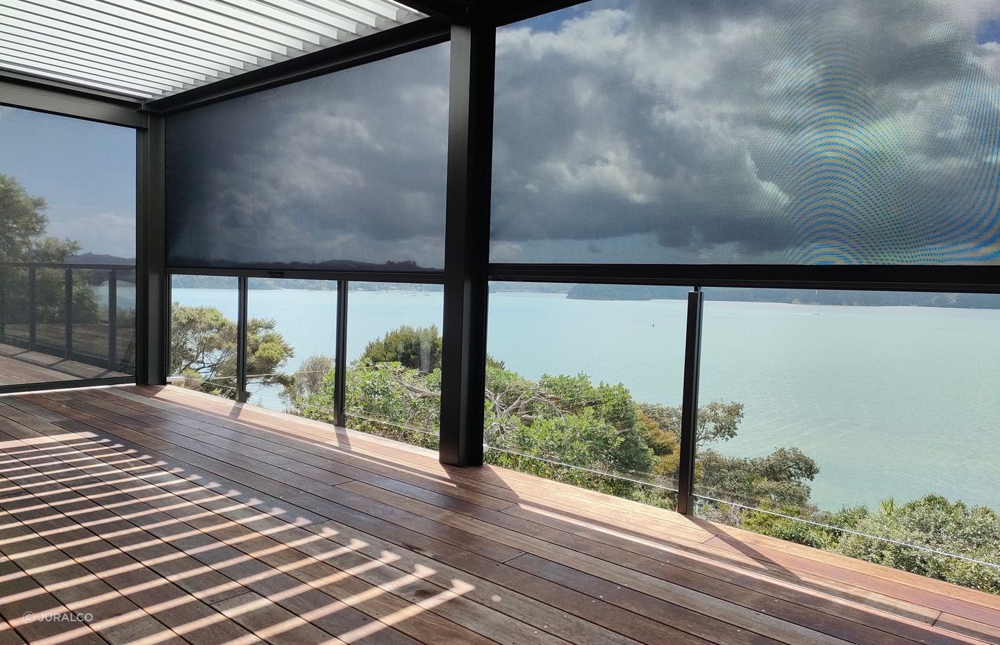 By following a thorough process, you'll ensure you pick the right outdoor blinds for your space, seen here with the Solarzip® Outdoor Blinds
from Juralco.