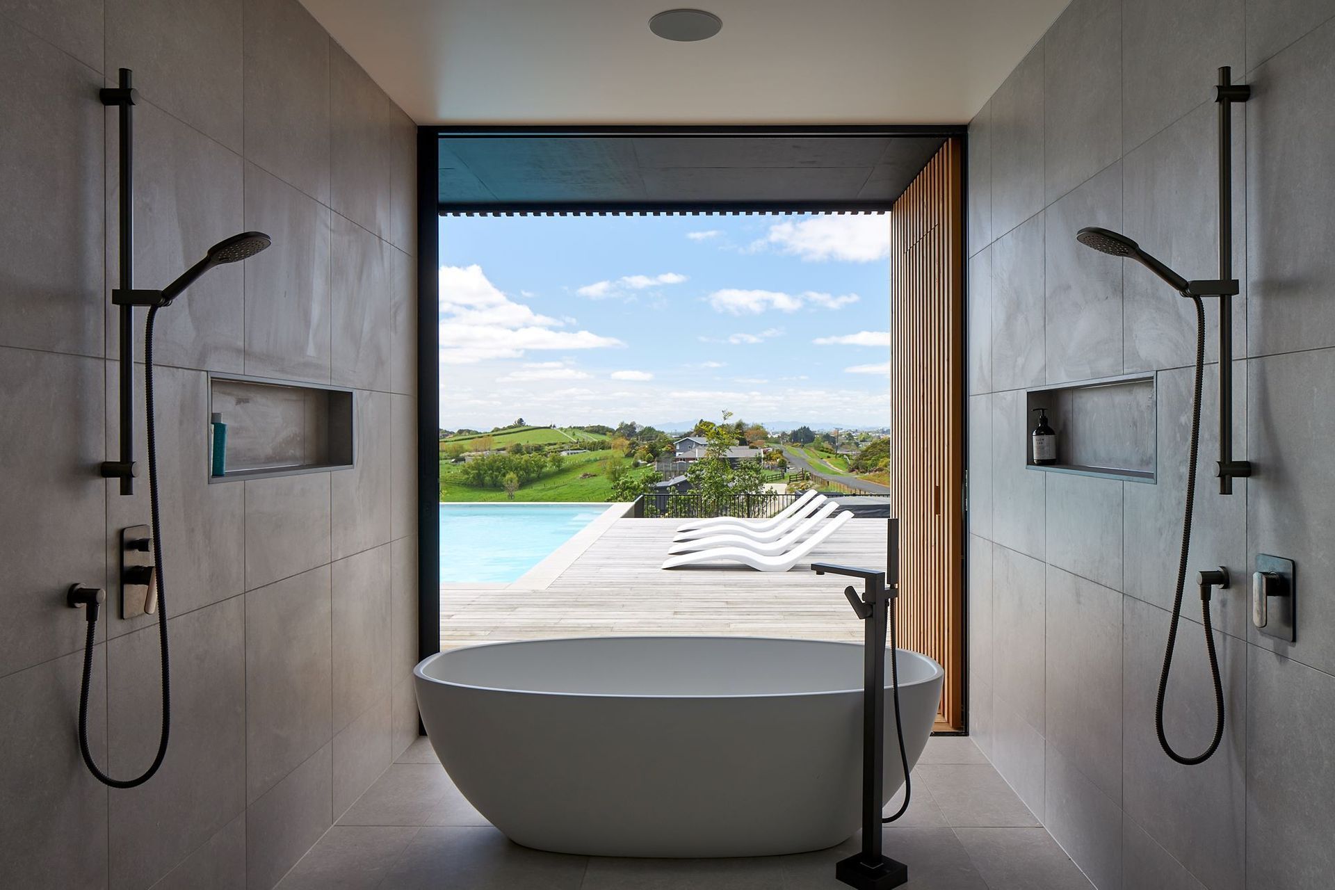 The showers help frame the beautiful view at the S&P House on the outskirts of Hamilton — Photography: Simon Wilson