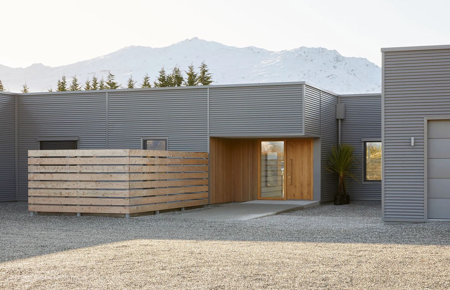 Hardscaping can enhance kerb appeal when done well, demonstrated here with the impressive Passive House in Queenstown.
