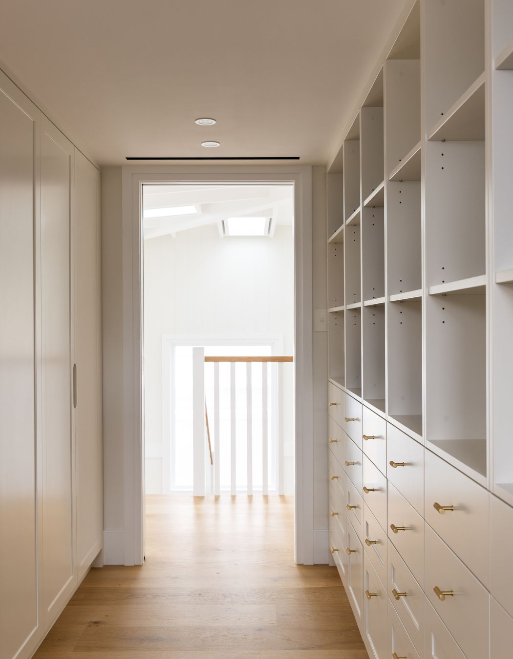 It can be installed as a shadowline detail at the wall/ceiling junction or in the ceiling to create a flangeless slot detail, as shown in this project by Studio Duo.