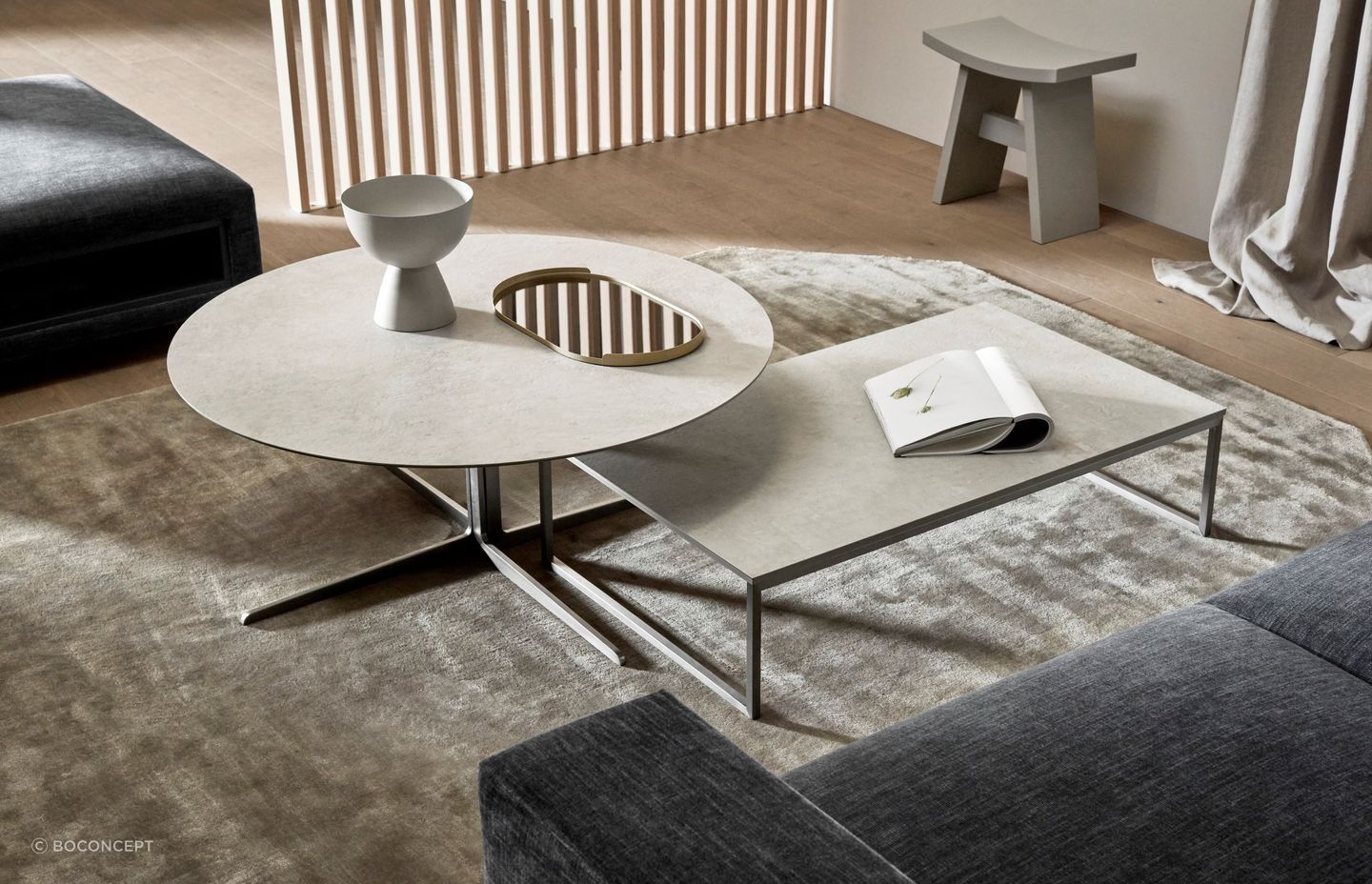 A mirrored surface can be used as a strategic surface to reflect an ornament or architectural feature of the room.