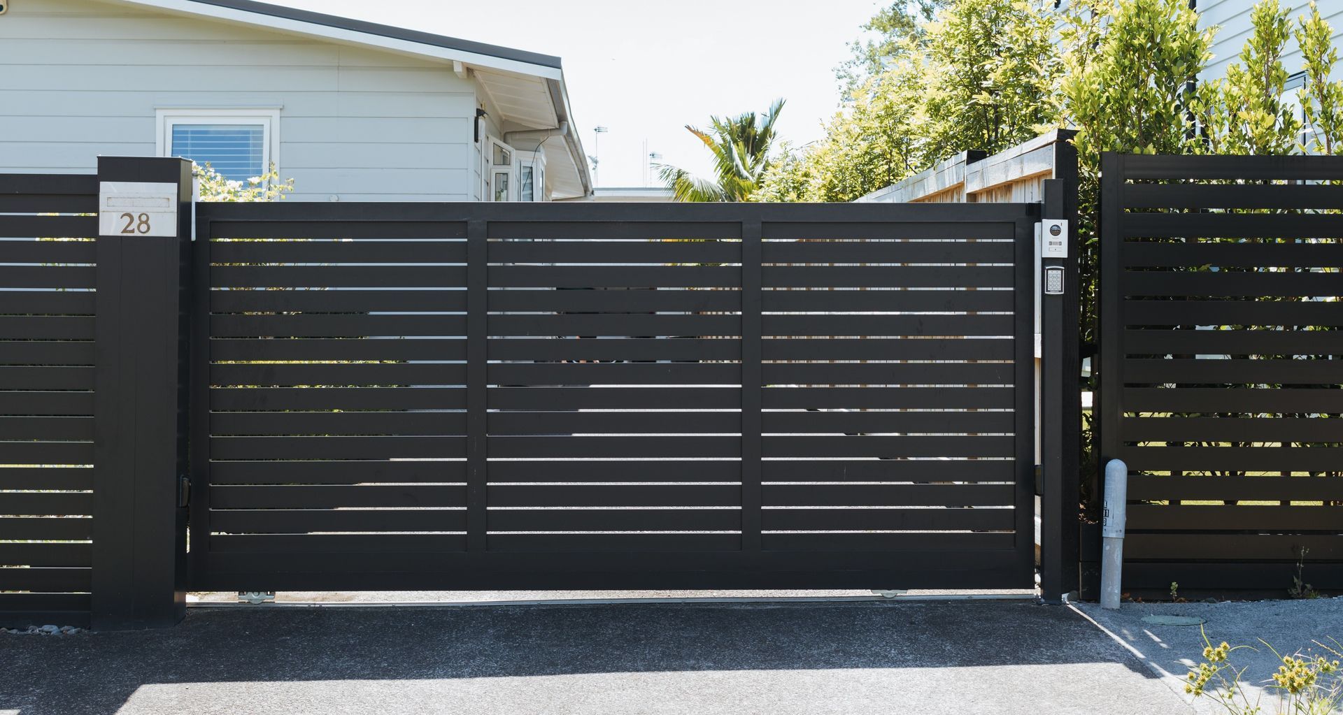 Slat Driveway Gates By Warner Fences & Gates.