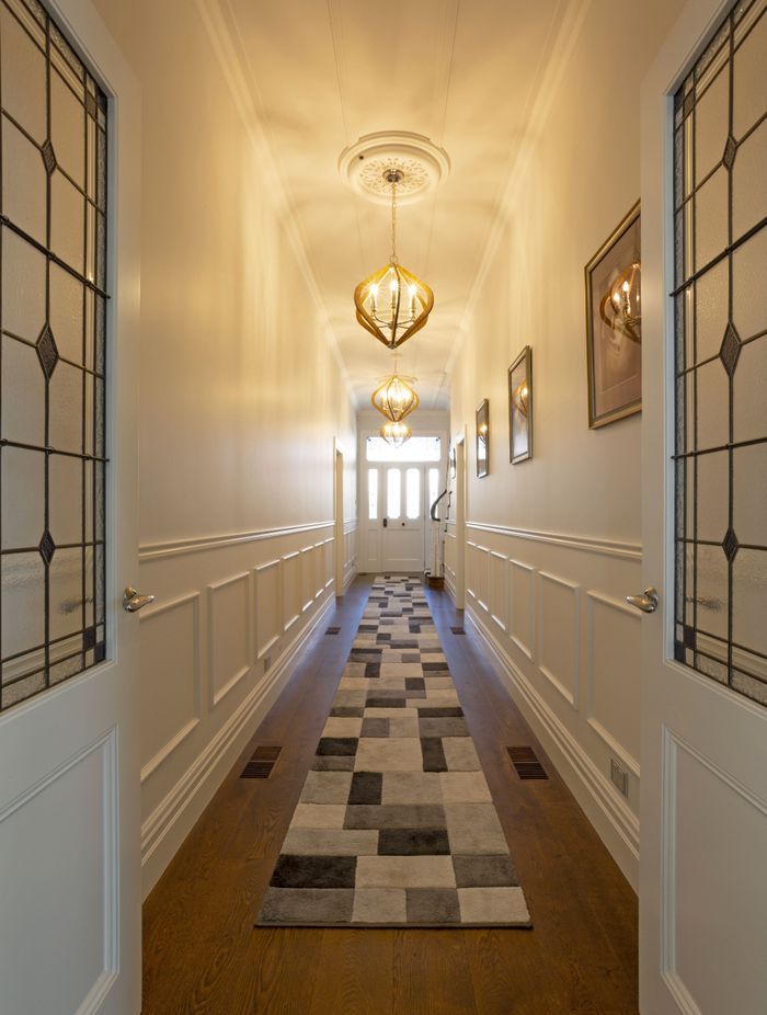 Combining modern flooring with character panelling and leadlights creates the perfect balance of old and new.