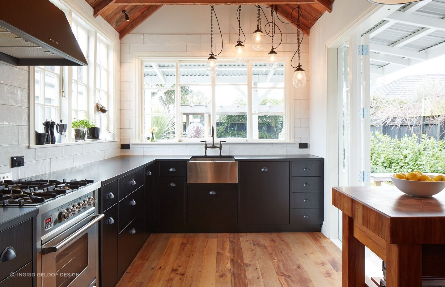 Cup handles are perfect for a rustic kitchen with a relaxing vibes as seen here in this award-winning kitchen by Ingrid Geldof Design.