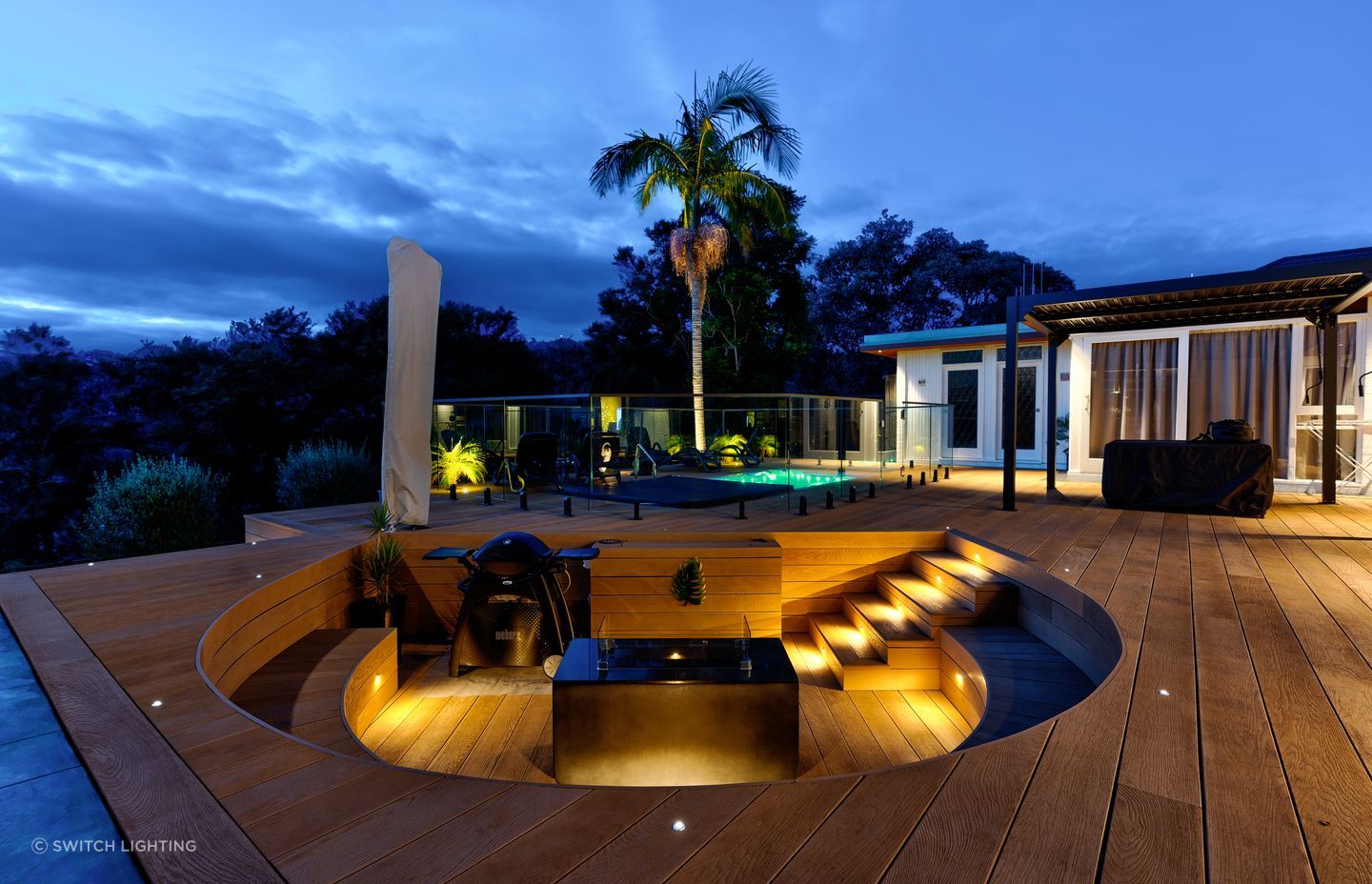 Switch Lighting Mini-LIGHTZ create an inviting atmosphere in this outdoor entertainment area.