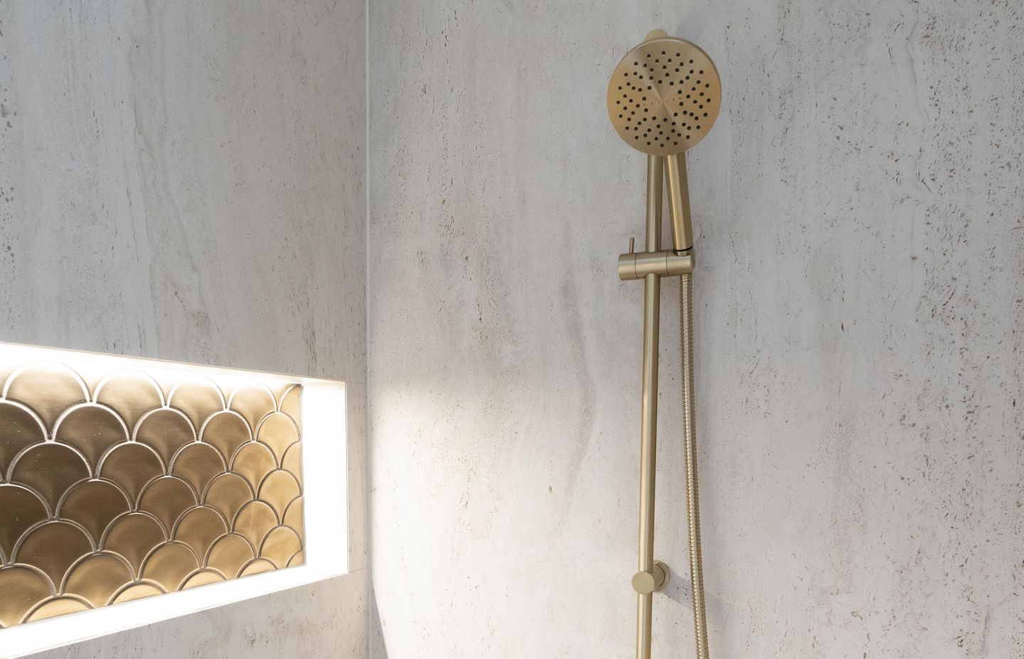 There are options available at every price point, like this very reasonable Tate Aerlux® Single Spray Slide Shower with high-end aesthetics.