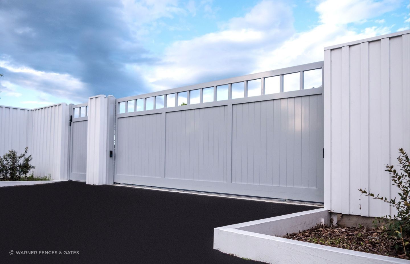 This Tongue &amp; Groove Driveway Gate By Warner Fences &amp; Gates is made from quality powder-coated aluminium.