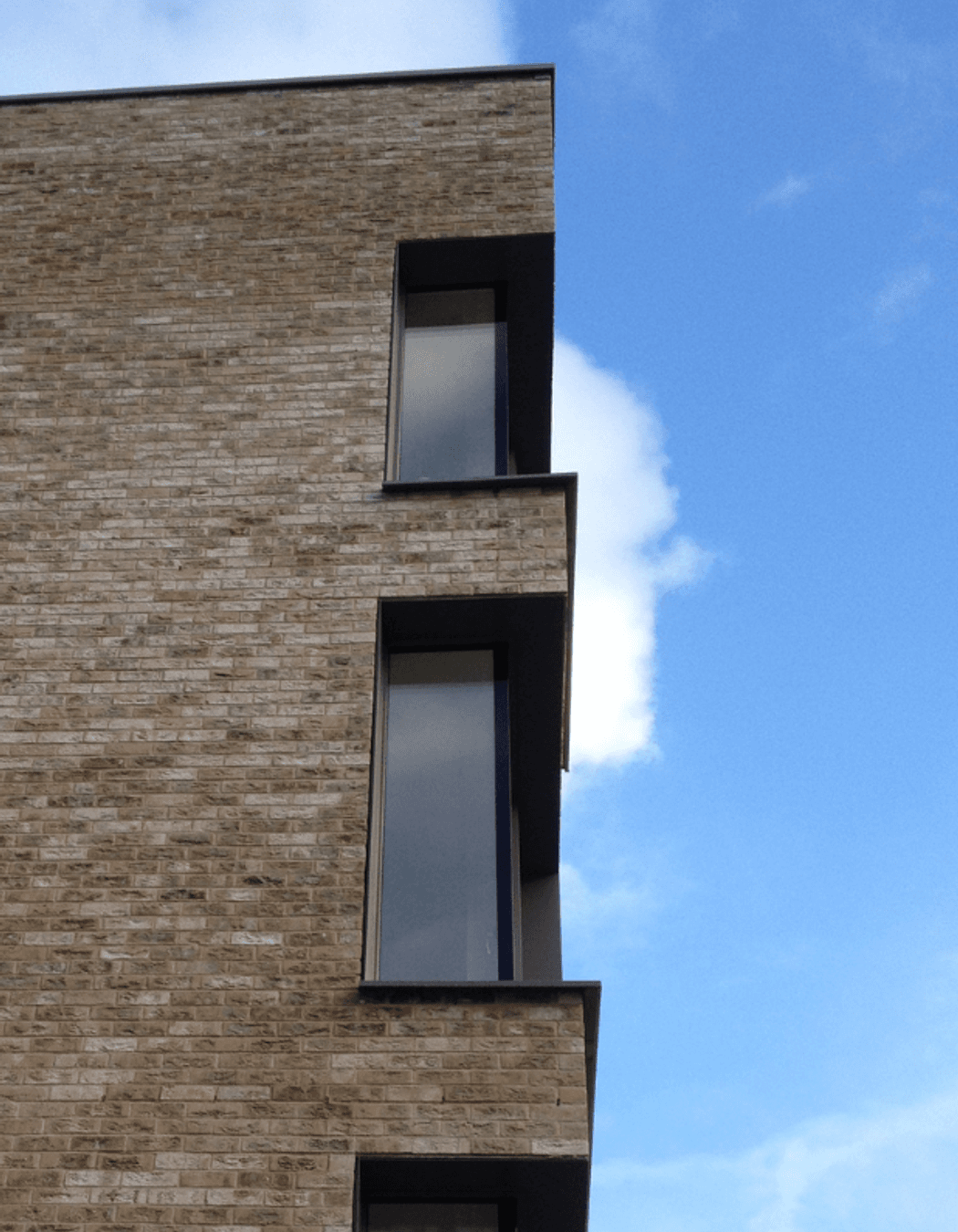 The building should be treated as a single structure.