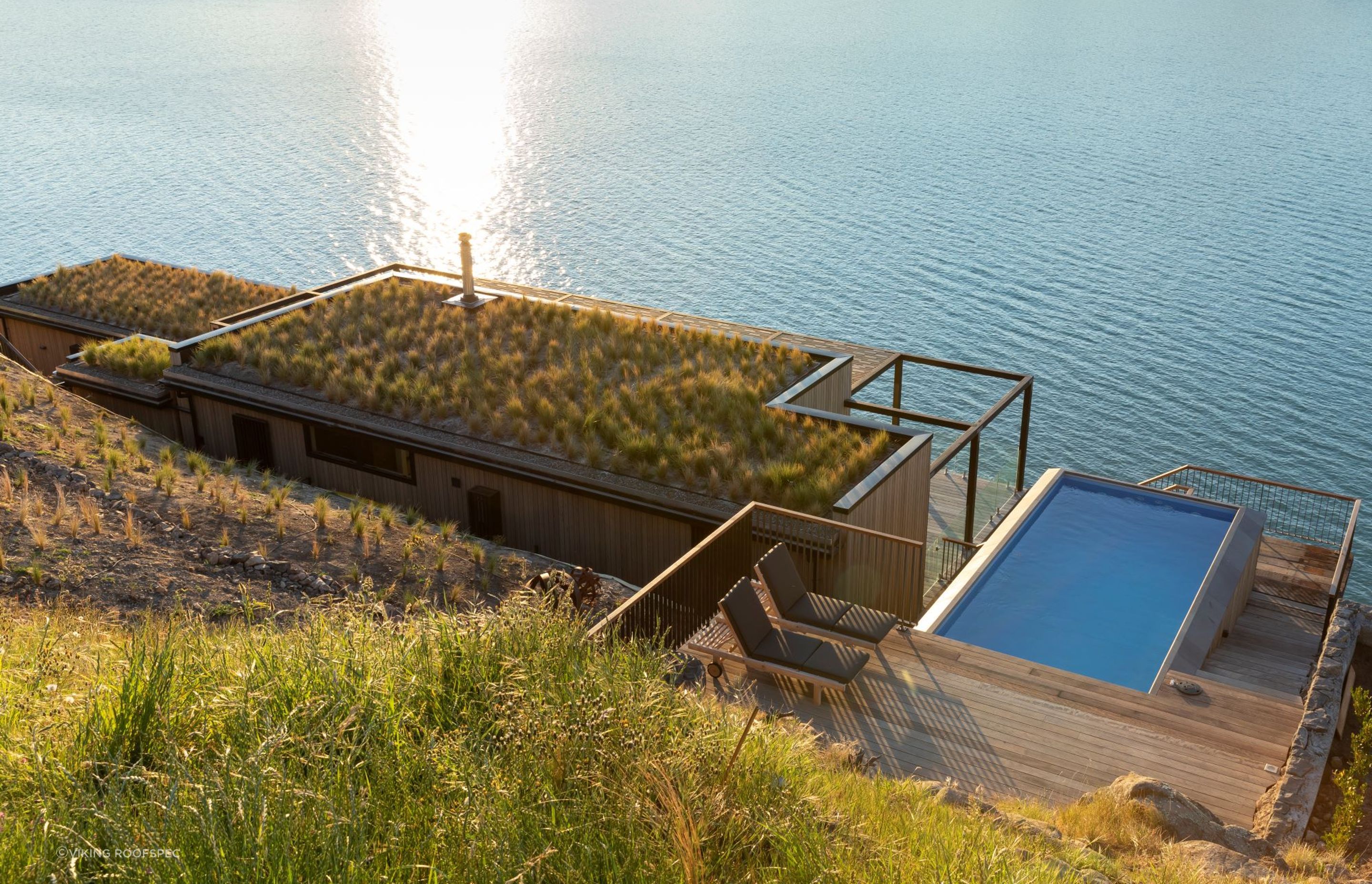 A green roof, like this Viking Roof Garden System, brings many social, economic and environmental benefits to a home.