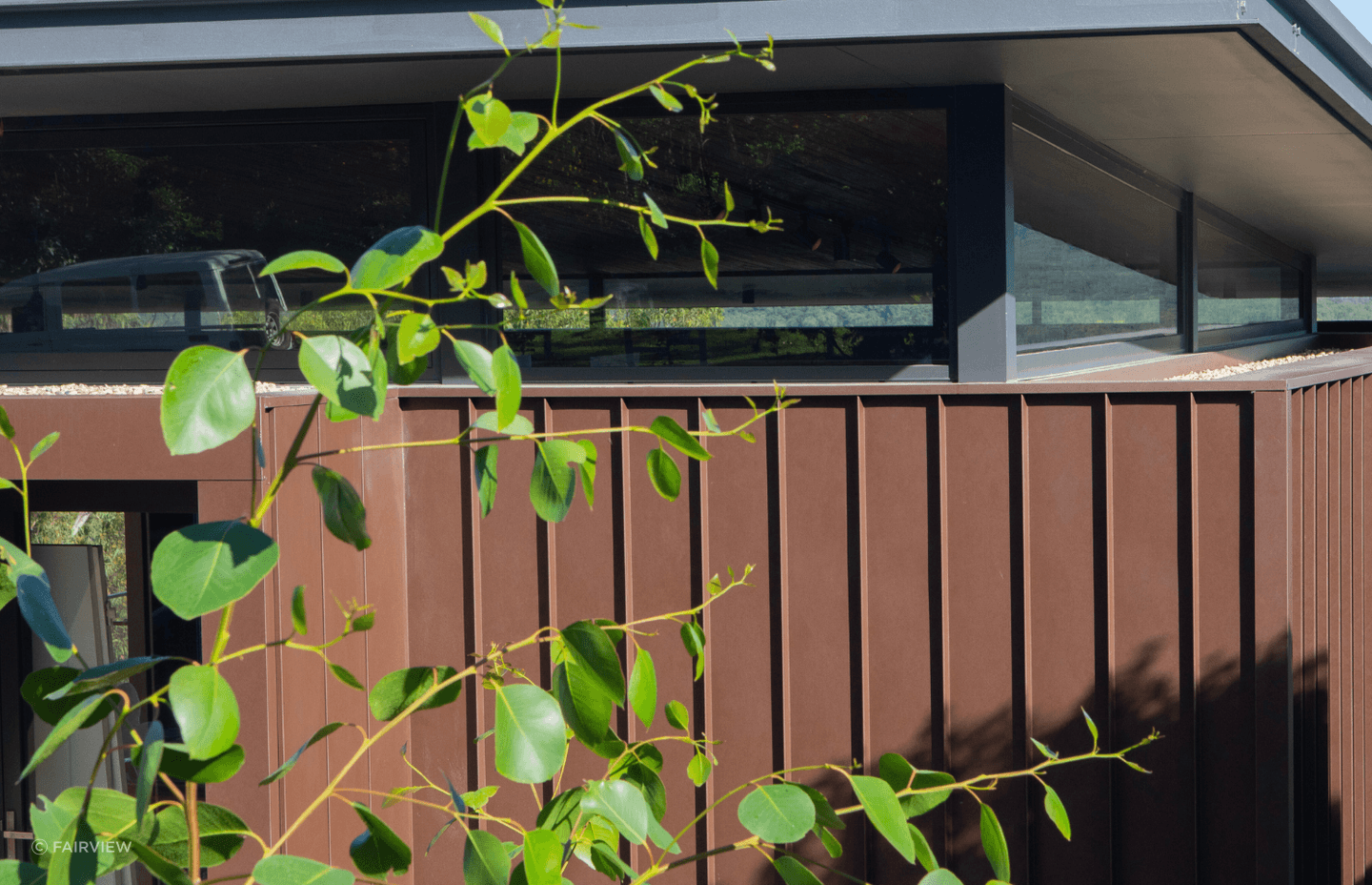 Formed steel cladding is available in a variety of patterned and woodgrain finishes. Featured product: Vitraloc - Roll Formed Steel Cladding.