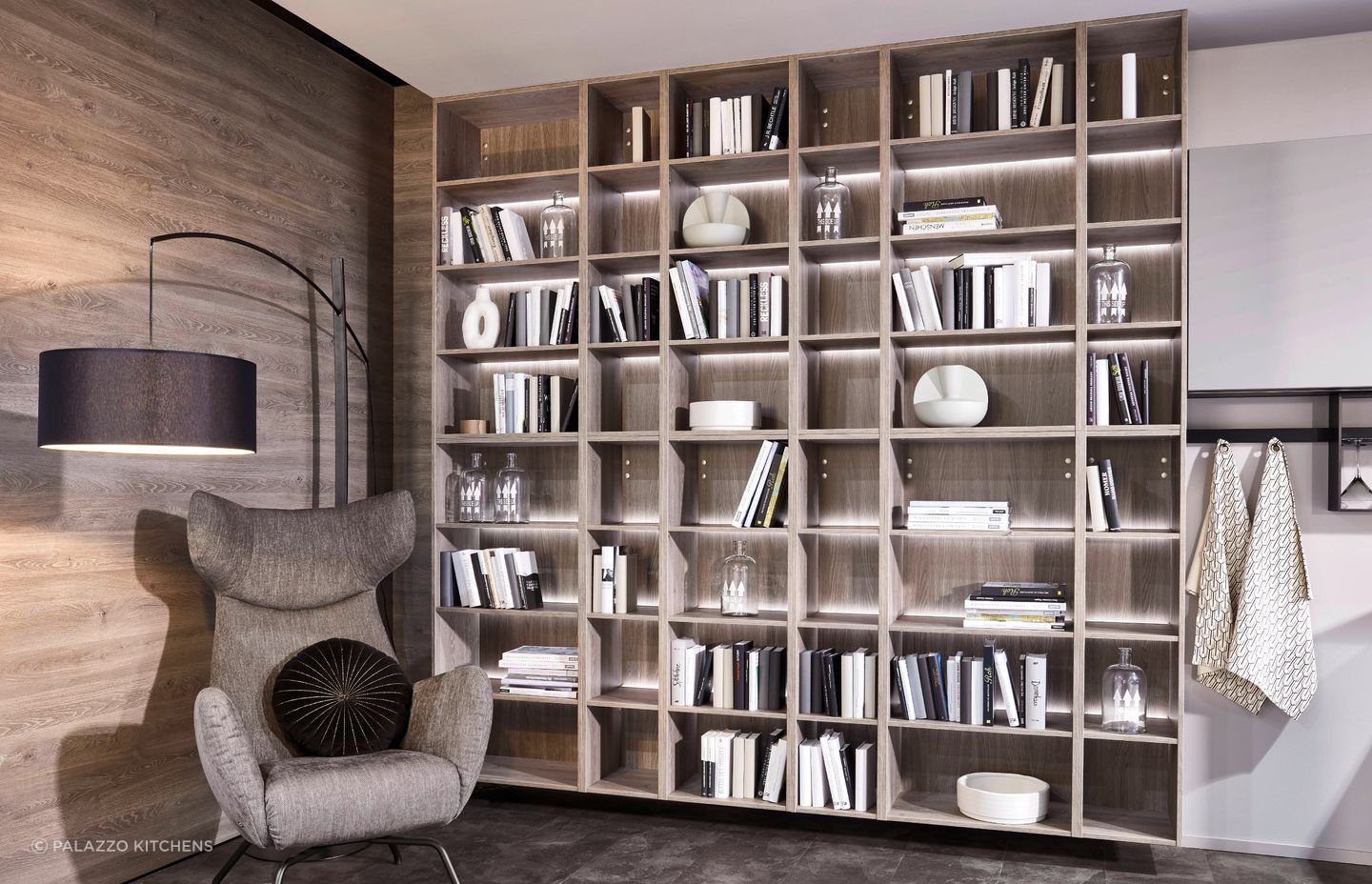 LED lighting can elevate and enhance a bookcase instantly, demonstrated with aplomb with this wall shelving system.