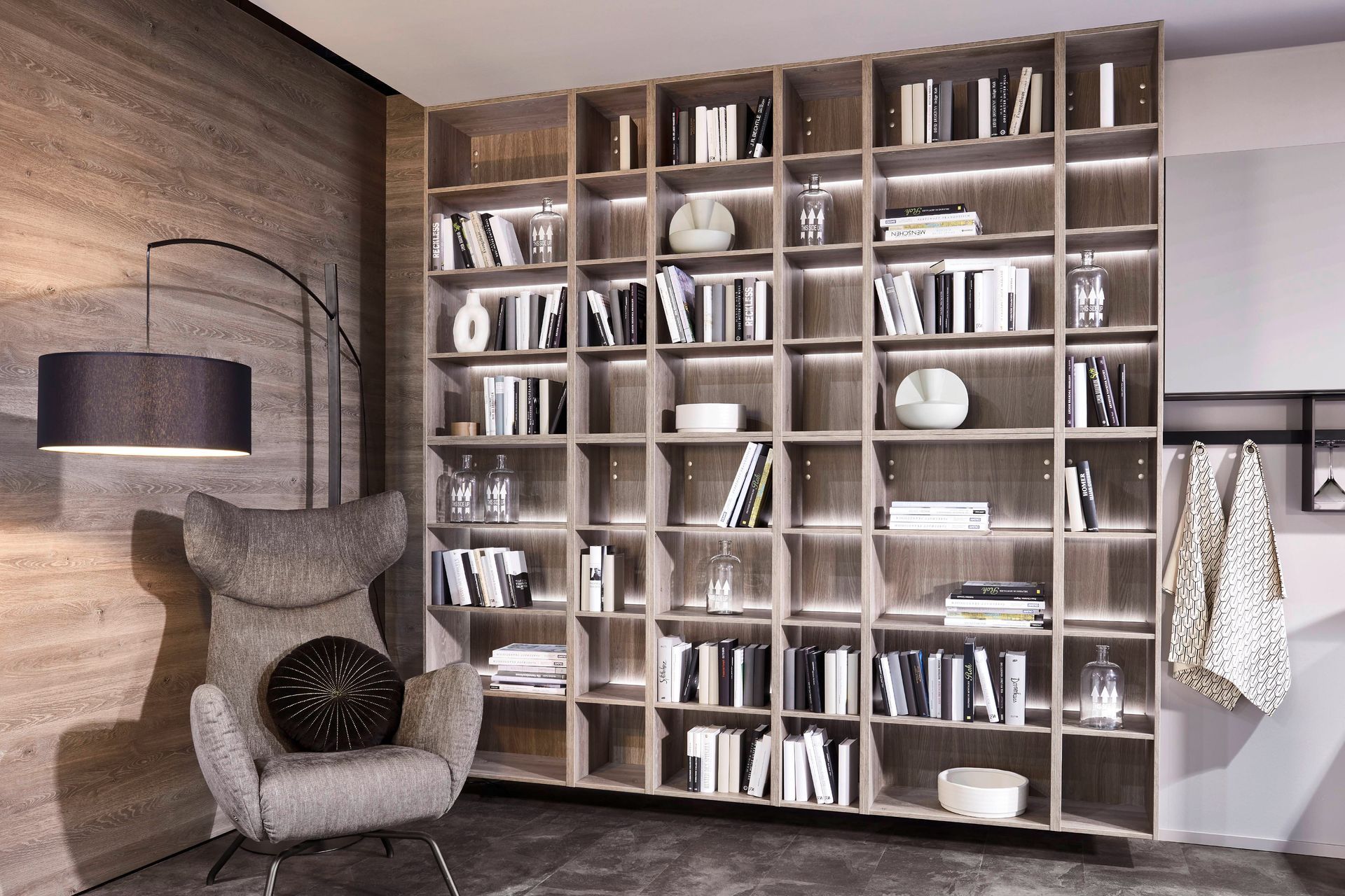 LED lighting can elevate and enhance a bookcase instantly, demonstrated with aplomb with this wall shelving system.
