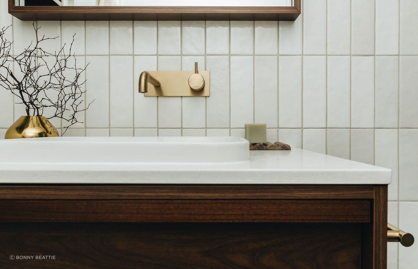 Less is more when it comes to capturing that sense of luxuriousness, as seen here in this Washington Ave renovation by Honour Creative. | Photographer: Bonny Beattie