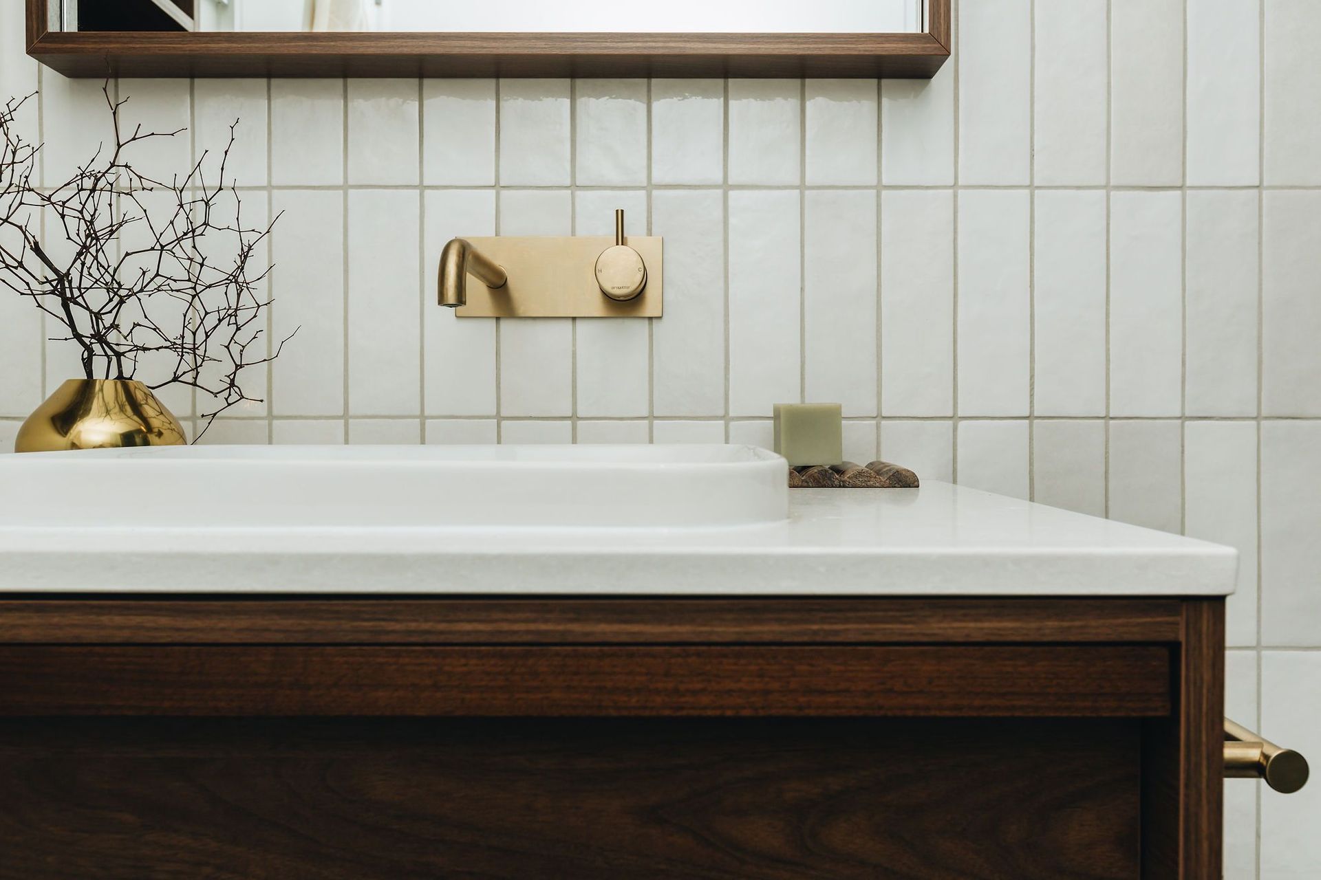 Less is more when it comes to capturing that sense of luxuriousness, as seen here in this Washington Ave renovation by Honour Creative. | Photographer: Bonny Beattie