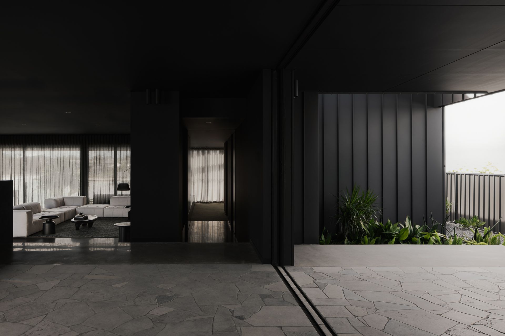 0042 Residence by Reitsma & Associates: Pocketed sliding doors are a great way to dissolve the threshold between indoors and out.