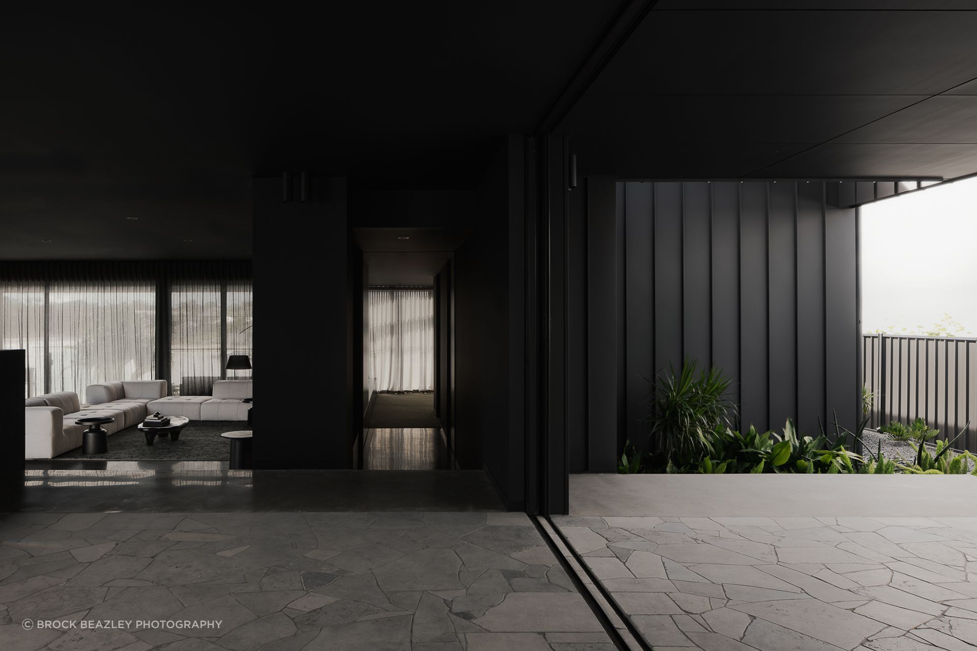 0042 Residence by Reitsma & Associates: Pocketed sliding doors are a great way to dissolve the threshold between indoors and out.