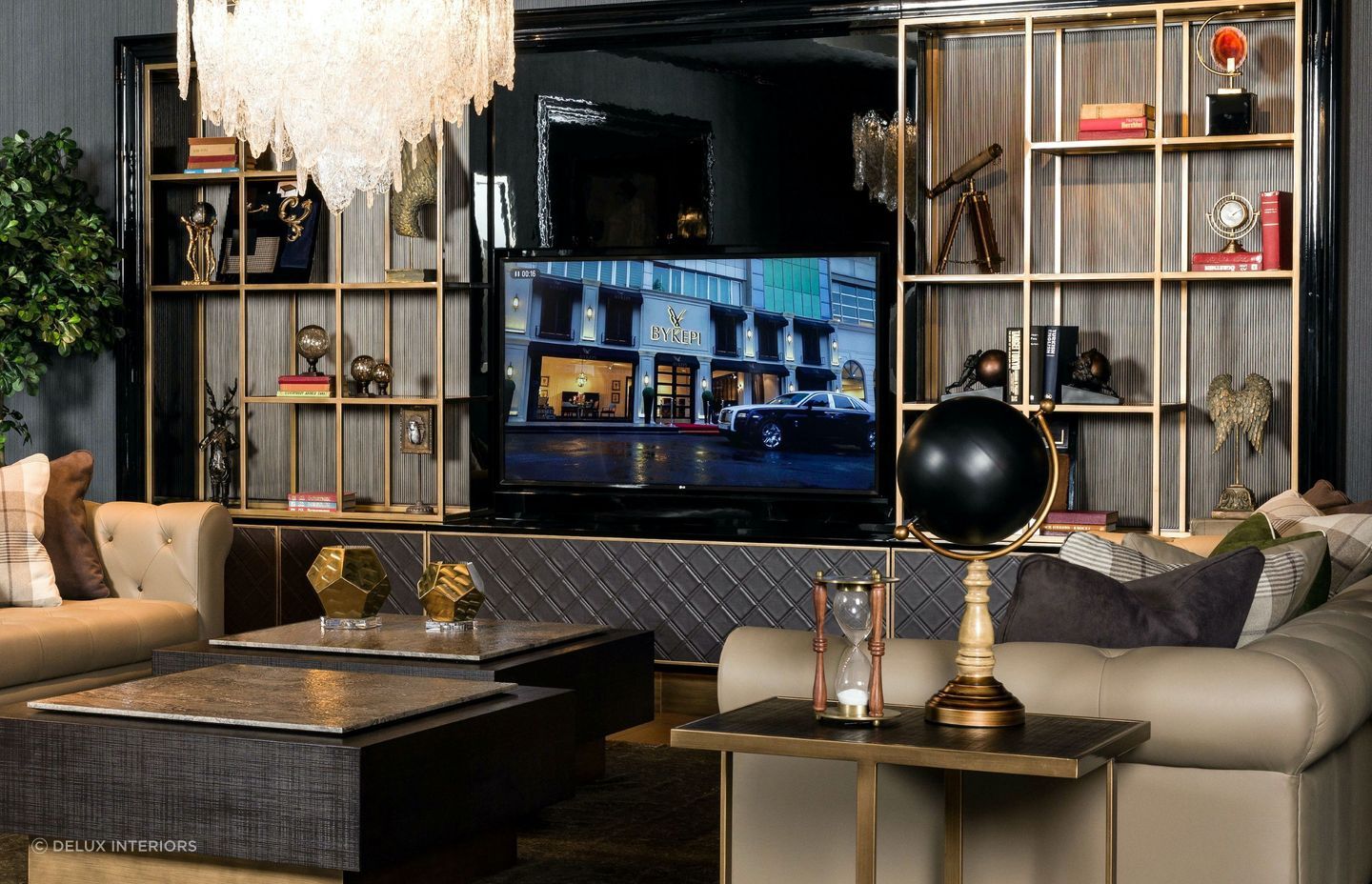 The inclusion of personal items and collections, superbly done here with the West Wall Unit from DeLux Interiors, can add character to a space.