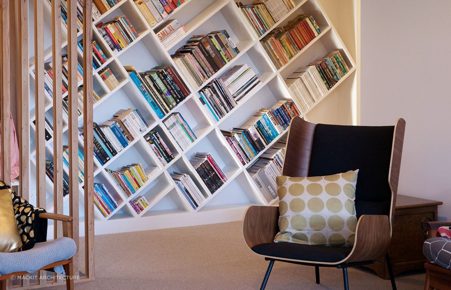 There are many ways to display your books and sometimes the design can help, seen here with this unique bookcase in this home in the Wairarapa.