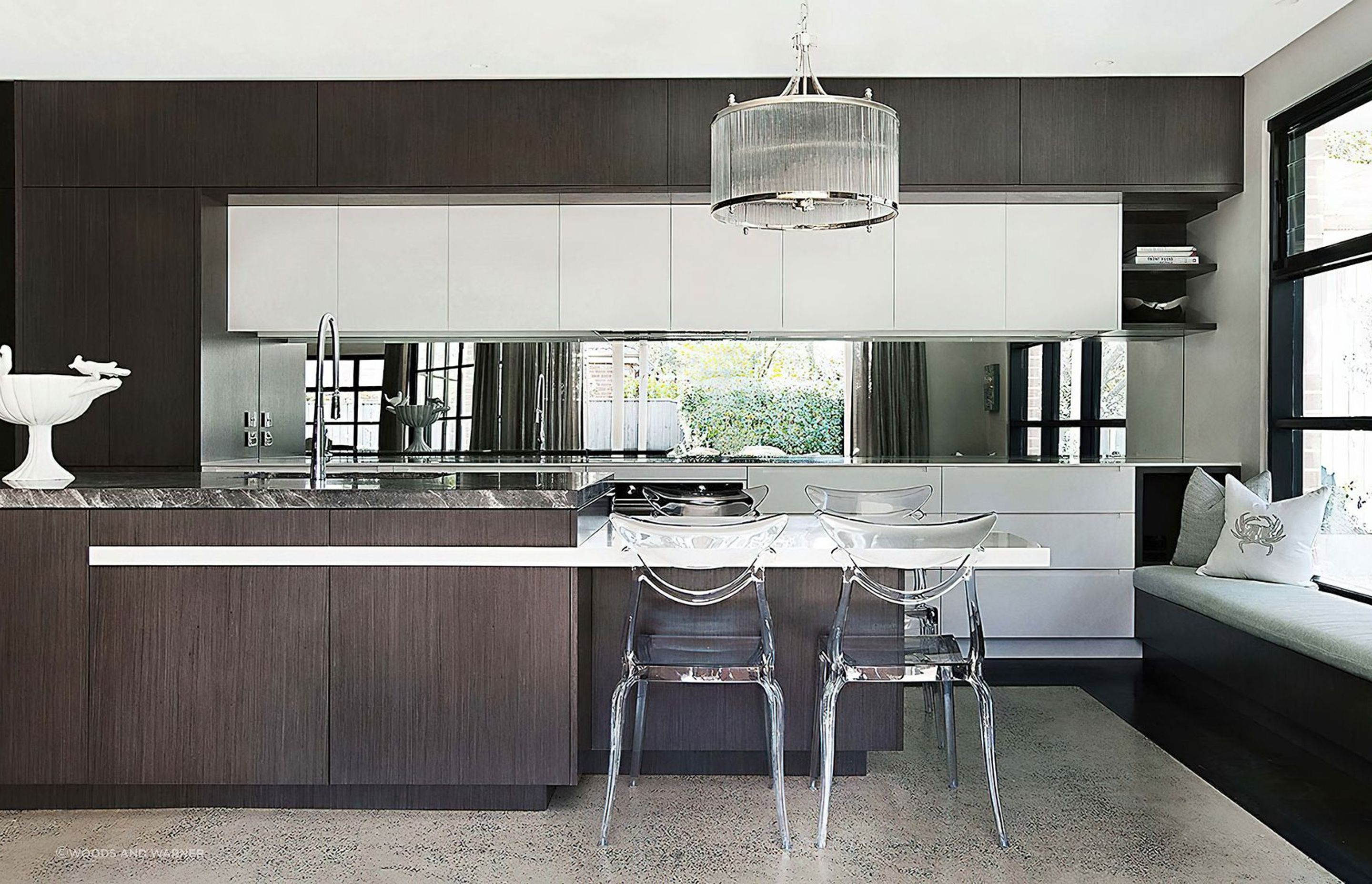 Glass kitchen lighting adds an elegant touch to a modern kitchen.