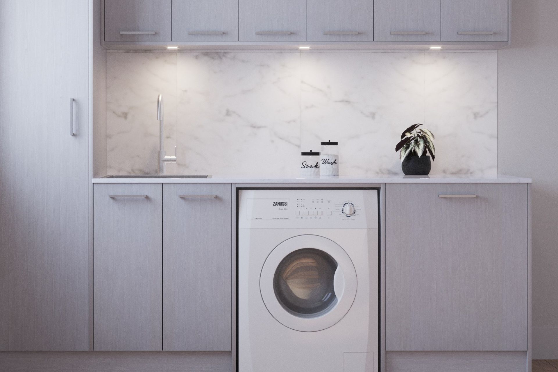 Under cabinet lights can be an important source of task lighting, complemented here nicely by Winter Birch cabinetry.