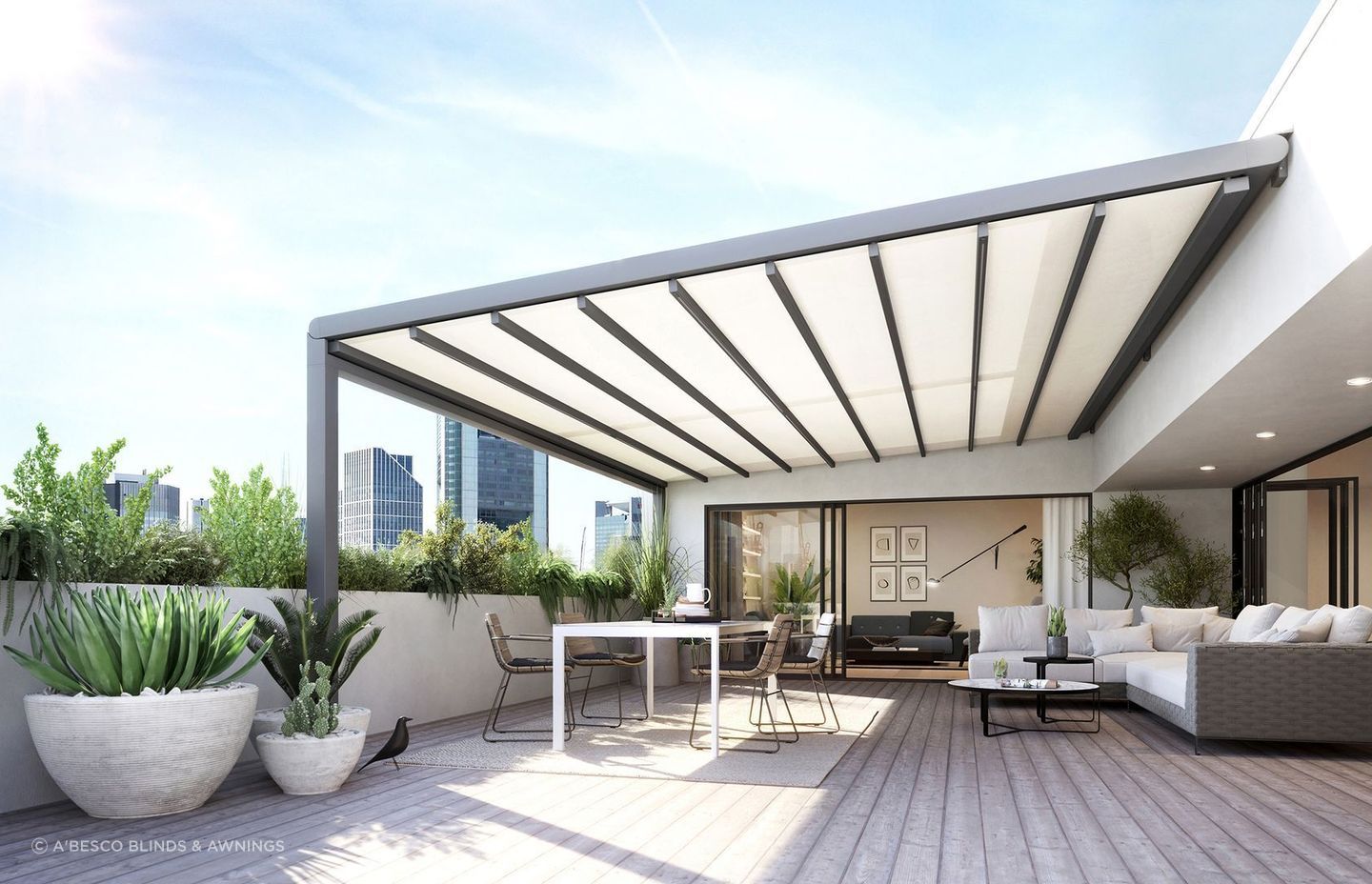 A modern deck featuring the award-winning Markilux Pergola Stretch Retractable Roof from A'besco Blinds &amp; Awnings with space-saving technology and optional LED lighting.