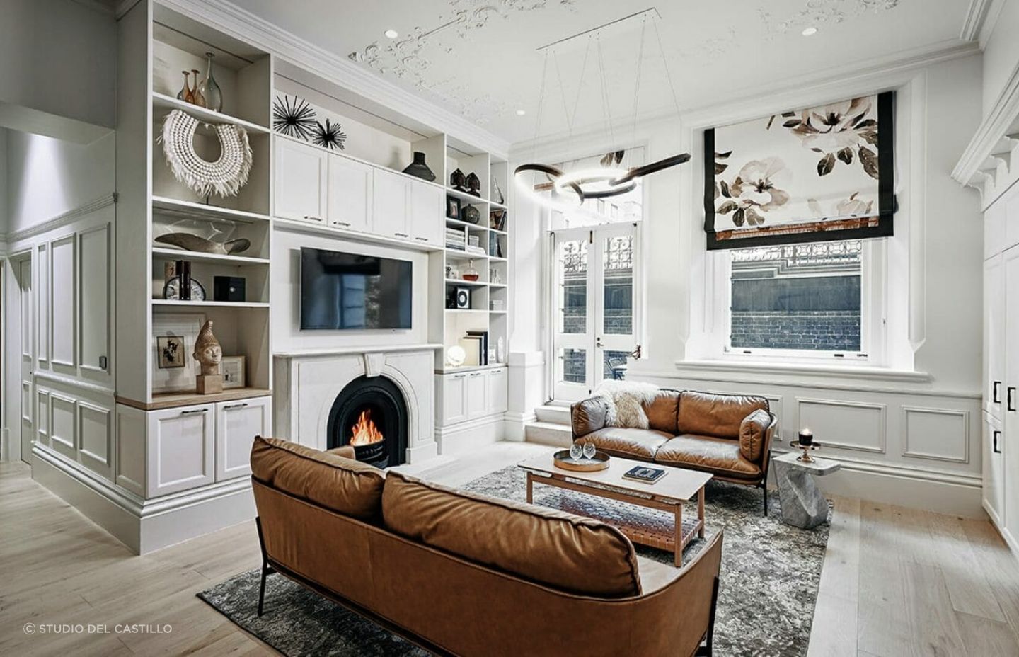 Adding floral blinds or curtains is a practical and straightforward way to start incorporating the Hamptons style into your living space. Project: The Grand by Studio Del Castillo.