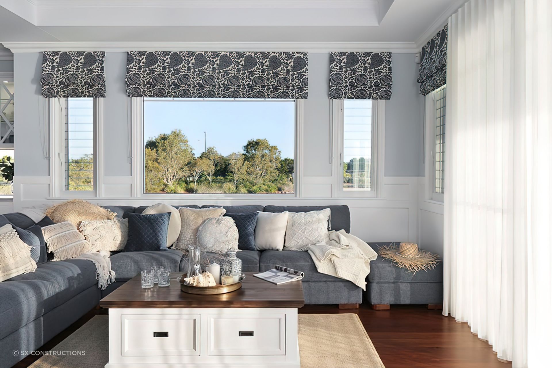 Large windows offer the perfect opportunity to adorn a living space with natural light. Project: Hamptons Hideaway by SX Constructions. Photography: Anastasia Kariofyllidis.
