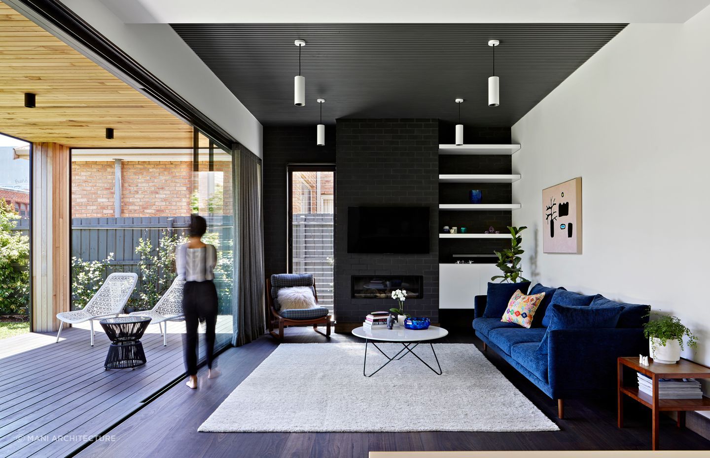 An open plan Hamptons style living space in a Californian bungalow located in Coburg North, Victoria. Photography: Tatjana Pitt