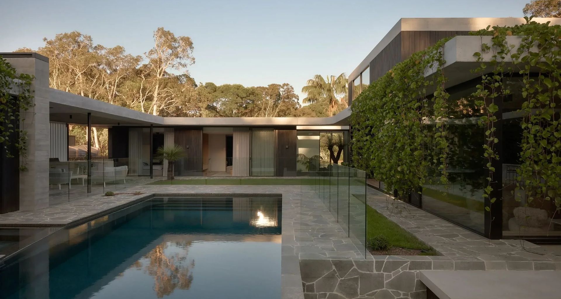 This home by Hive Architecture, is designed to seamlessly blend privacy and openness, connecting the residents to the lush bushland surroundings while providing a sense of refuge and sanctuary within. Photo credit: Brock Beazley.